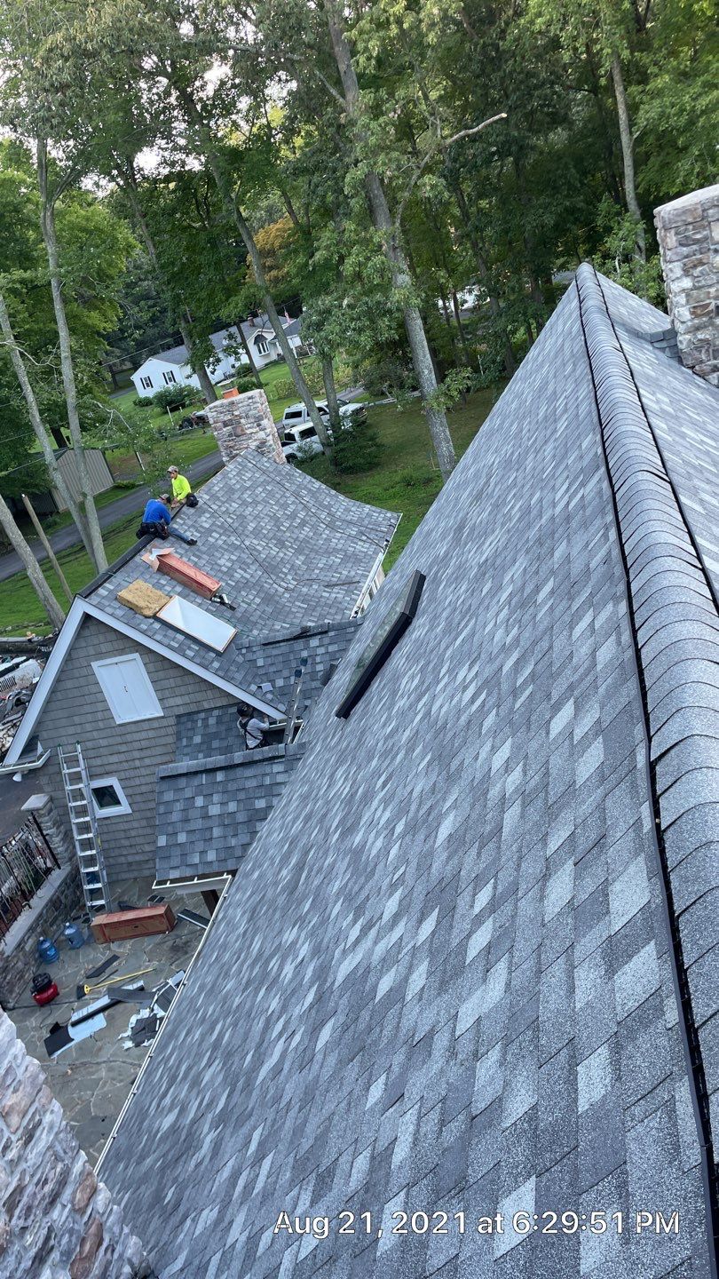 Roof Replacement using IKO Dynasty by American Home Contractors
