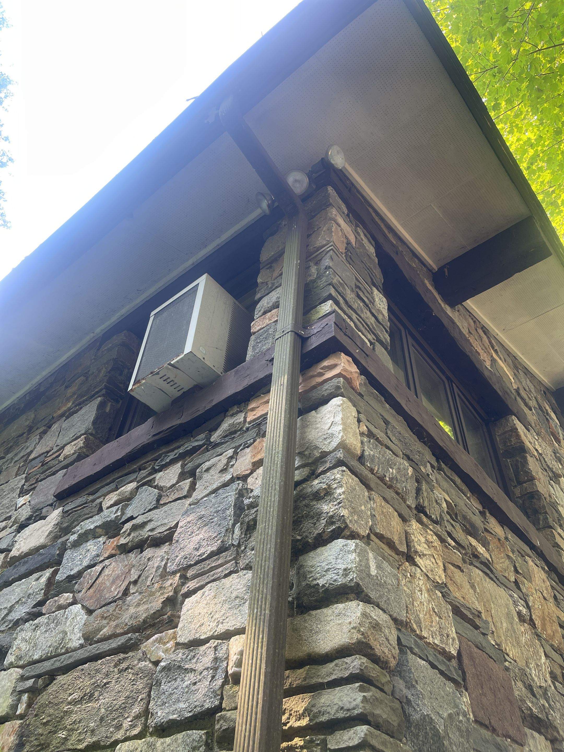 Gutter Installation using 5k Brown Gutters by A Plus Exterior