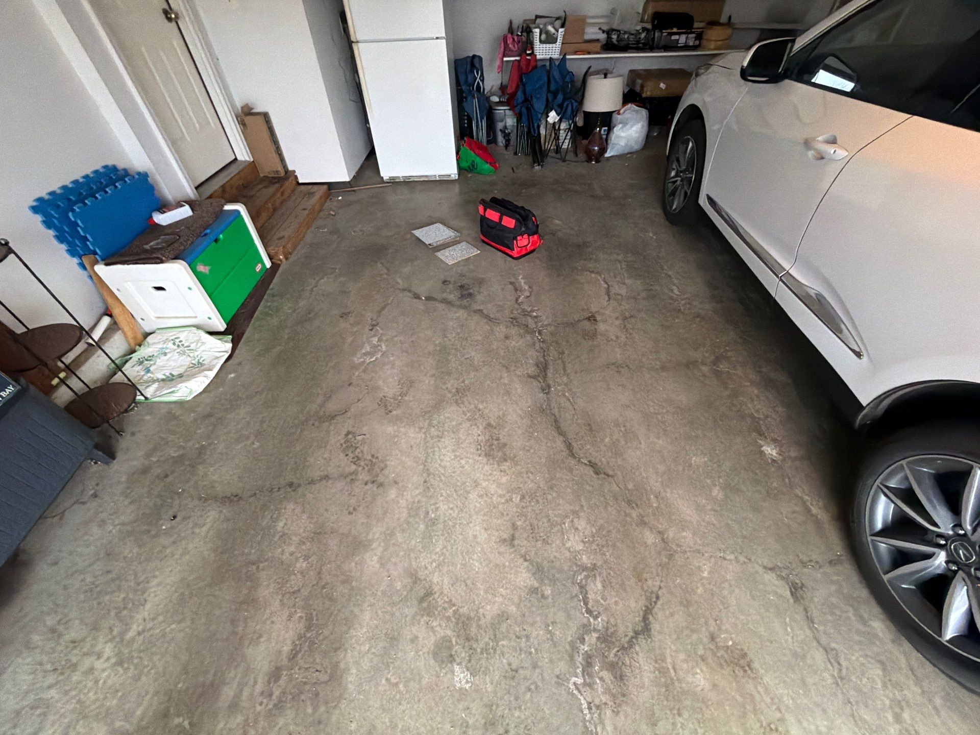 Decorative Chip Epoxy Garage Floor Coating in Sioux Falls by Select Painting, Coatings & Garage Cabinets