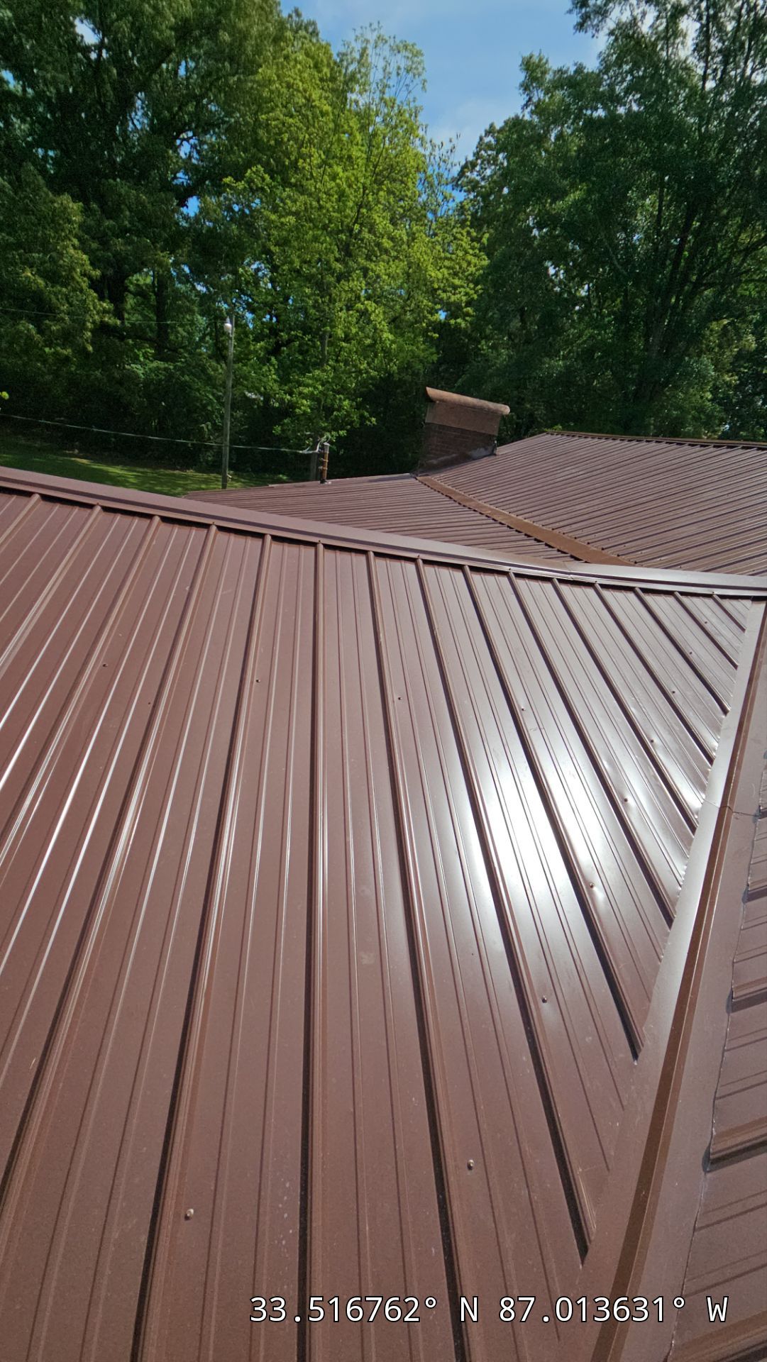 Metal Roof Replacement in Sylvan Springs (Brown) by The Roofing Dudes