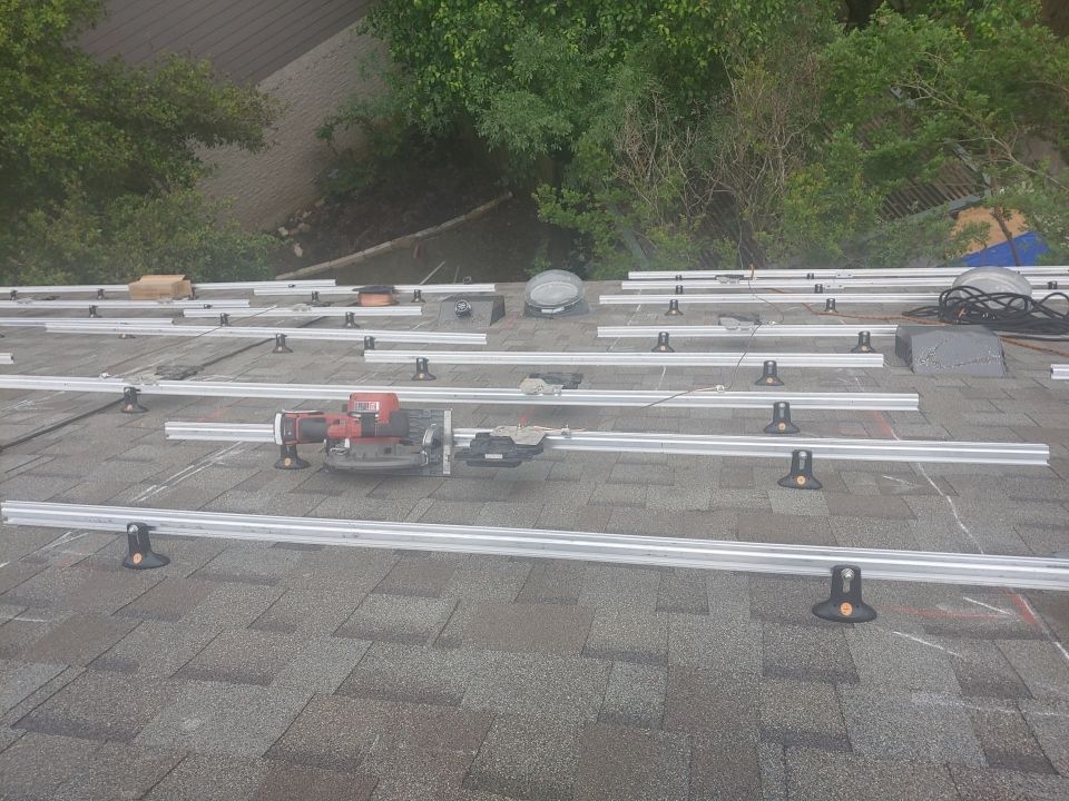 Residential Roof Replacement and Solar Panel Integration in Austin by Caliber Restoration LLC