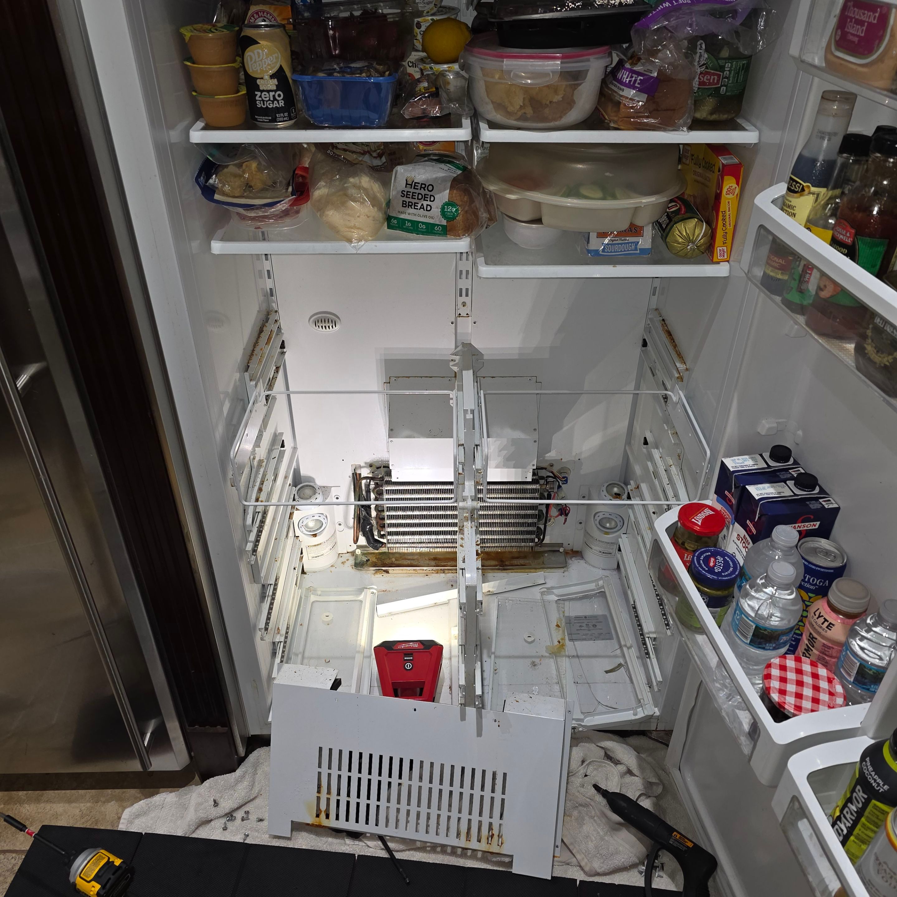 GE Monogram Built-In Refrigerator Cooling System Repair in Clermont by AMB-WORKS APPLIANCE REPAIR