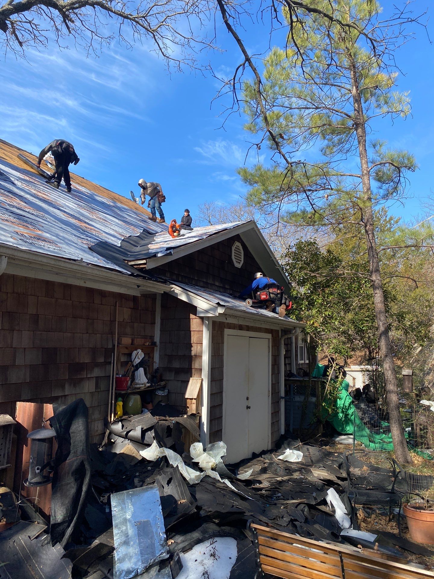 Roof Replacement on a private lake near Ardmore by BANA Roofing and Solar Supply