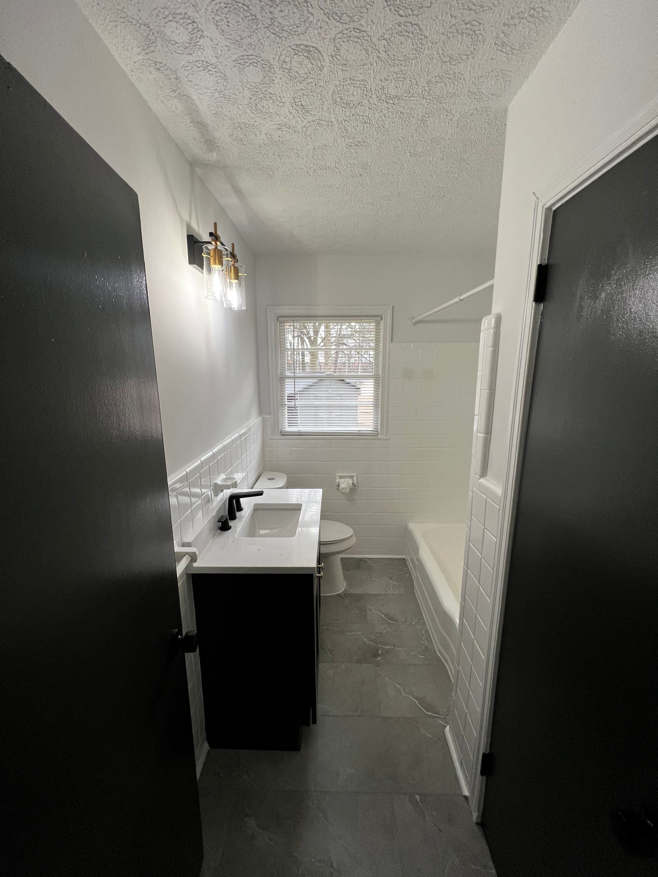 Marietta Interior Renovation Featuring Kitchen, Bathroom, and Hardwood Flooring Upgrades by Swift Home Renovations