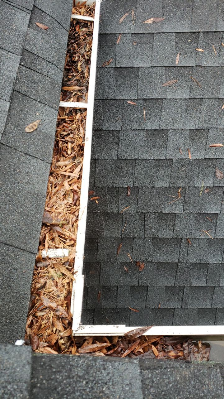 Gutter Cleaning using water by Power Wash Masters LLC