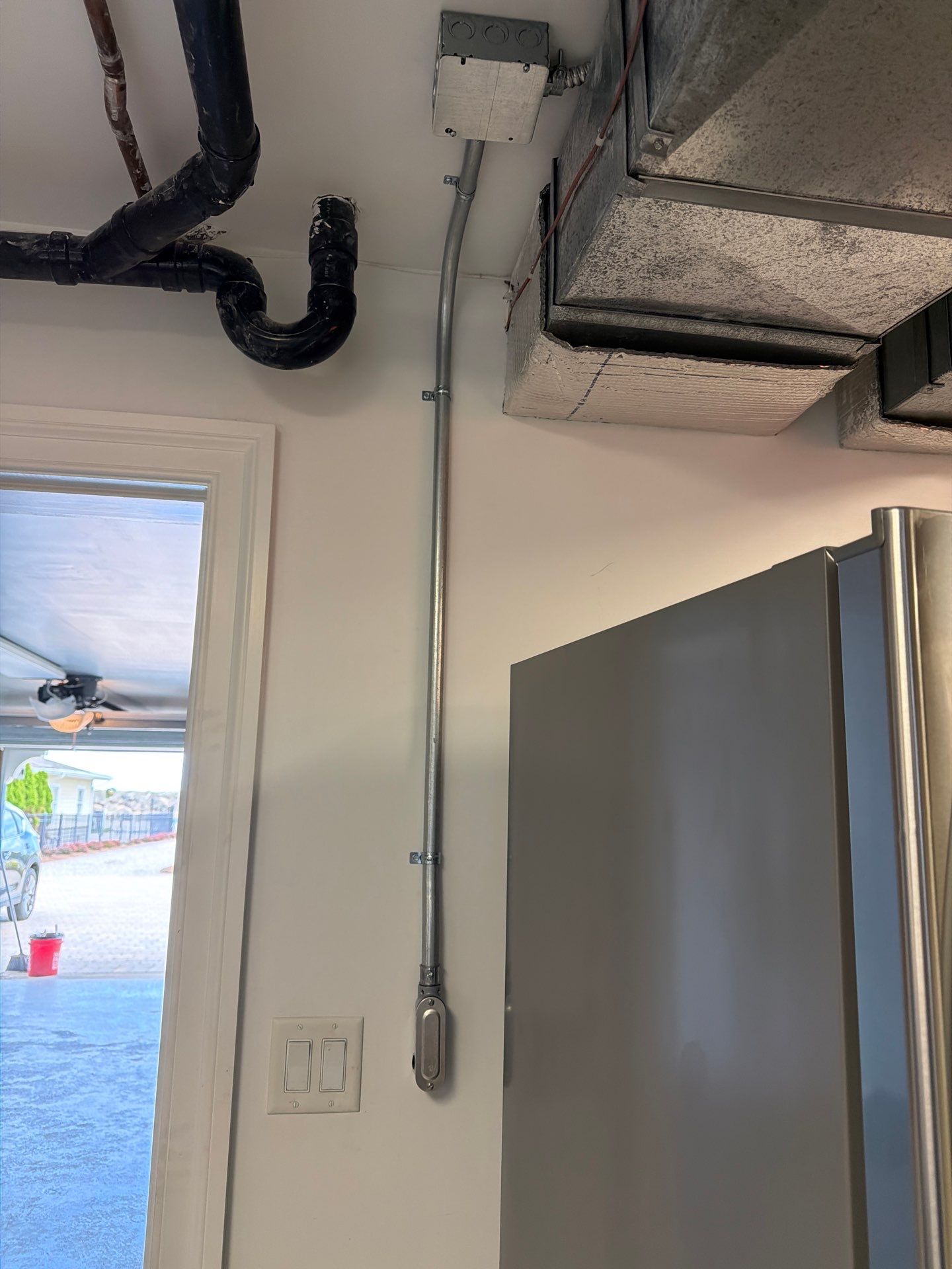 Tesla EV Charger Installation with Generac Load Management by Spartan Home Pros