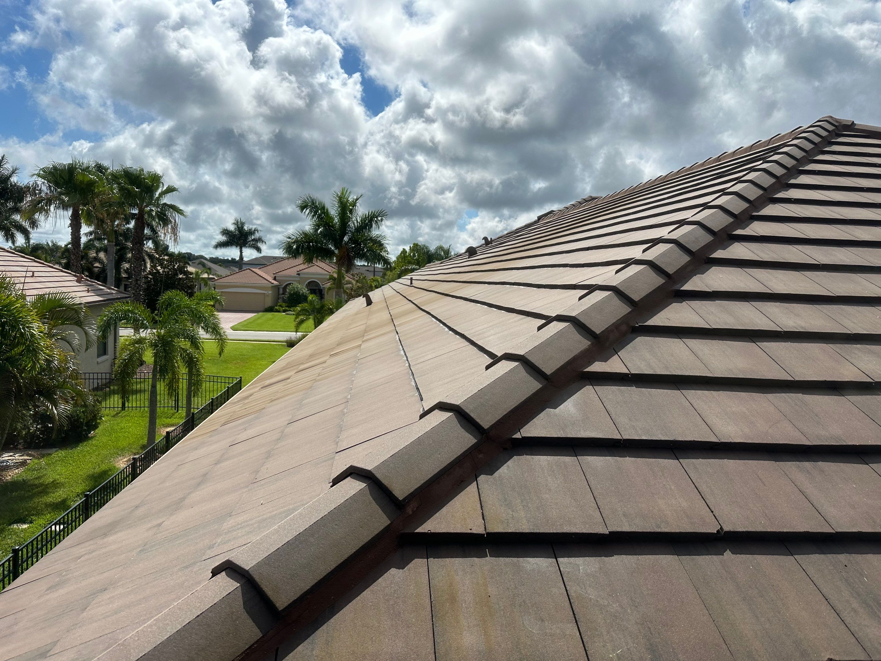 Flat Tile Roof Cleaning, House Wash & Sidewalk Cleaning in Enclave at Country Meadows, Bradenton, FL | Sunshine AquaWash by Sunshine AquaWash