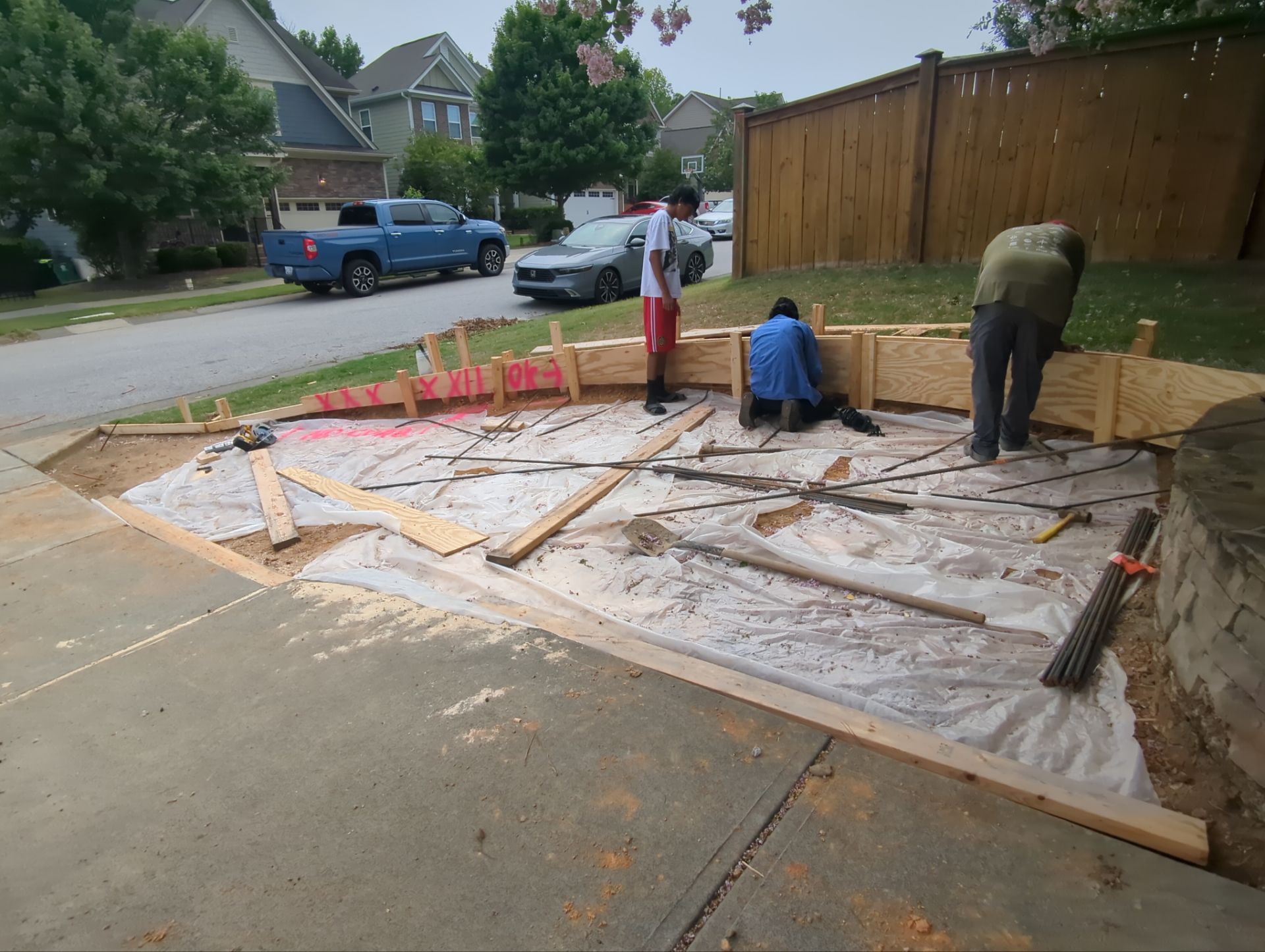 Concrete Driveway Expansion & Retaining Wall | Apex, NC by Elite Remodeling and Design LLC