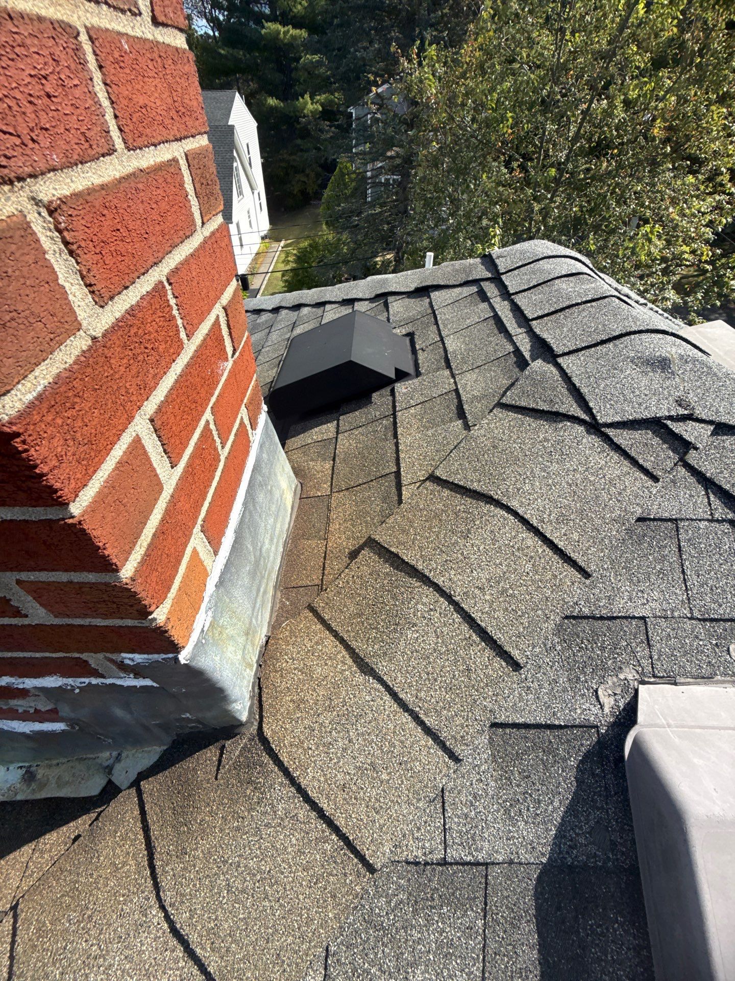 Chimney Area Roof Repair – Lexington, MA by Mighty Dog Roofing of Greater Middlesex County