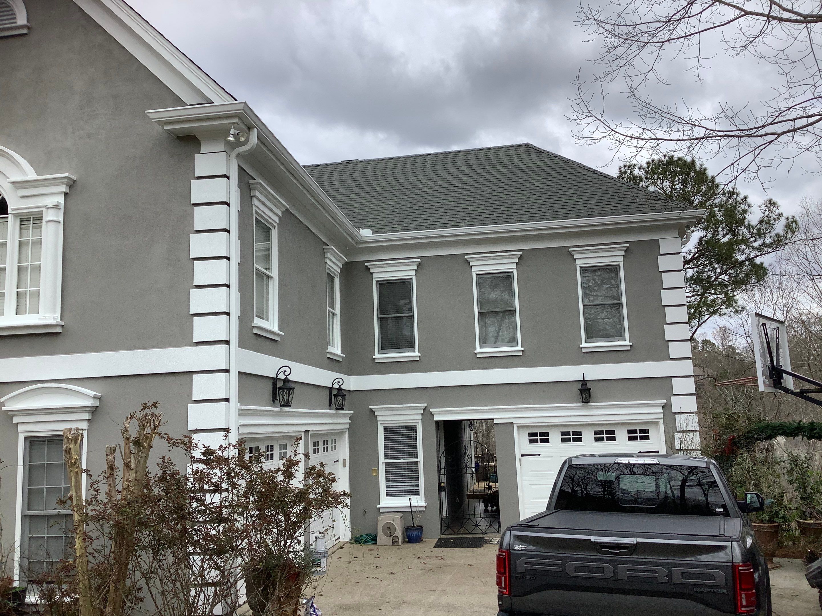 Exterior Stucco Painting and White Trim Update in Roswell by Swift Home Renovations