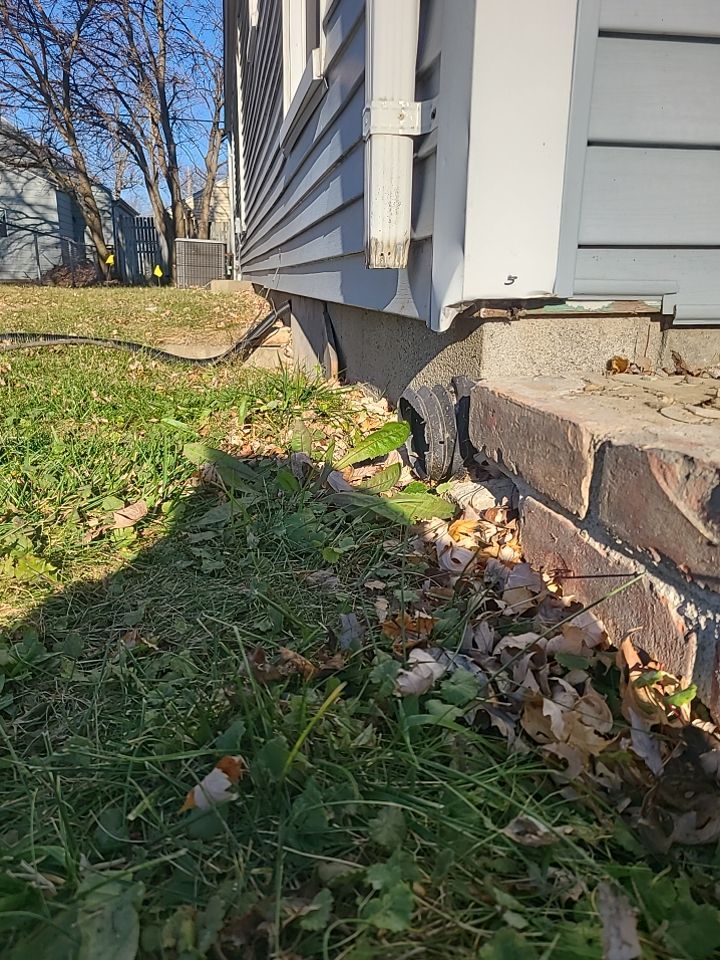 Lifting Home With Piers using Magnum Piers by Toledo Basement Repair