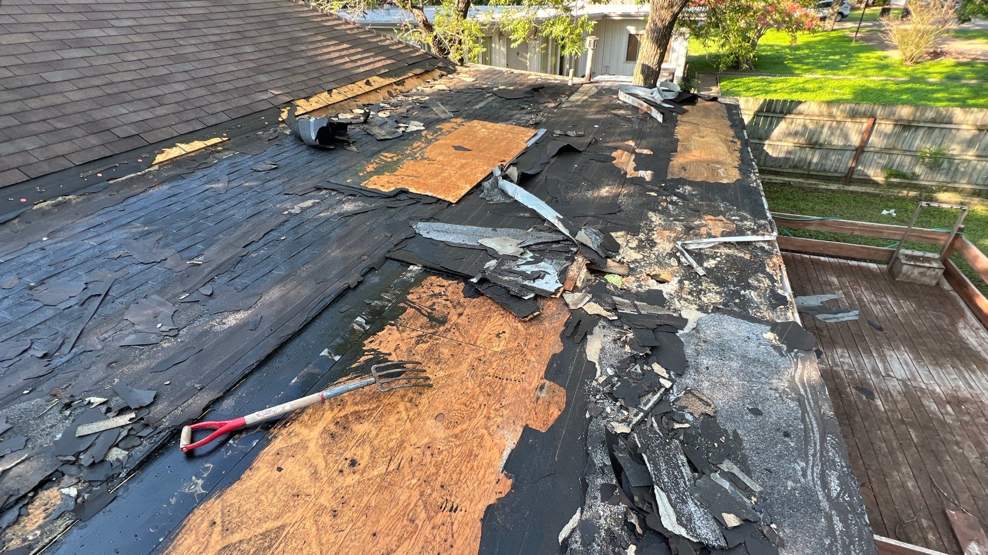 Residential Roofing Installation using Modified Bitumen Roll Roofing by Harvey Roofing & Construction