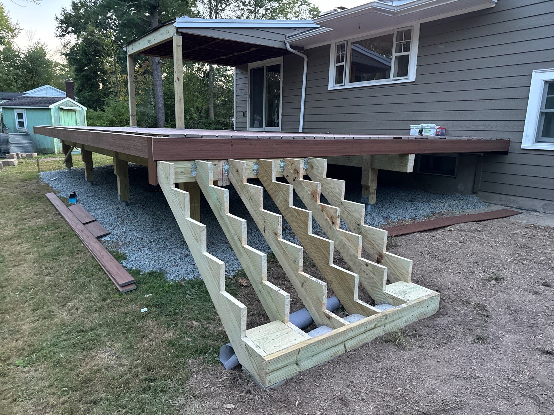 New Deck using Trex Tiki Torch  by deck guardian