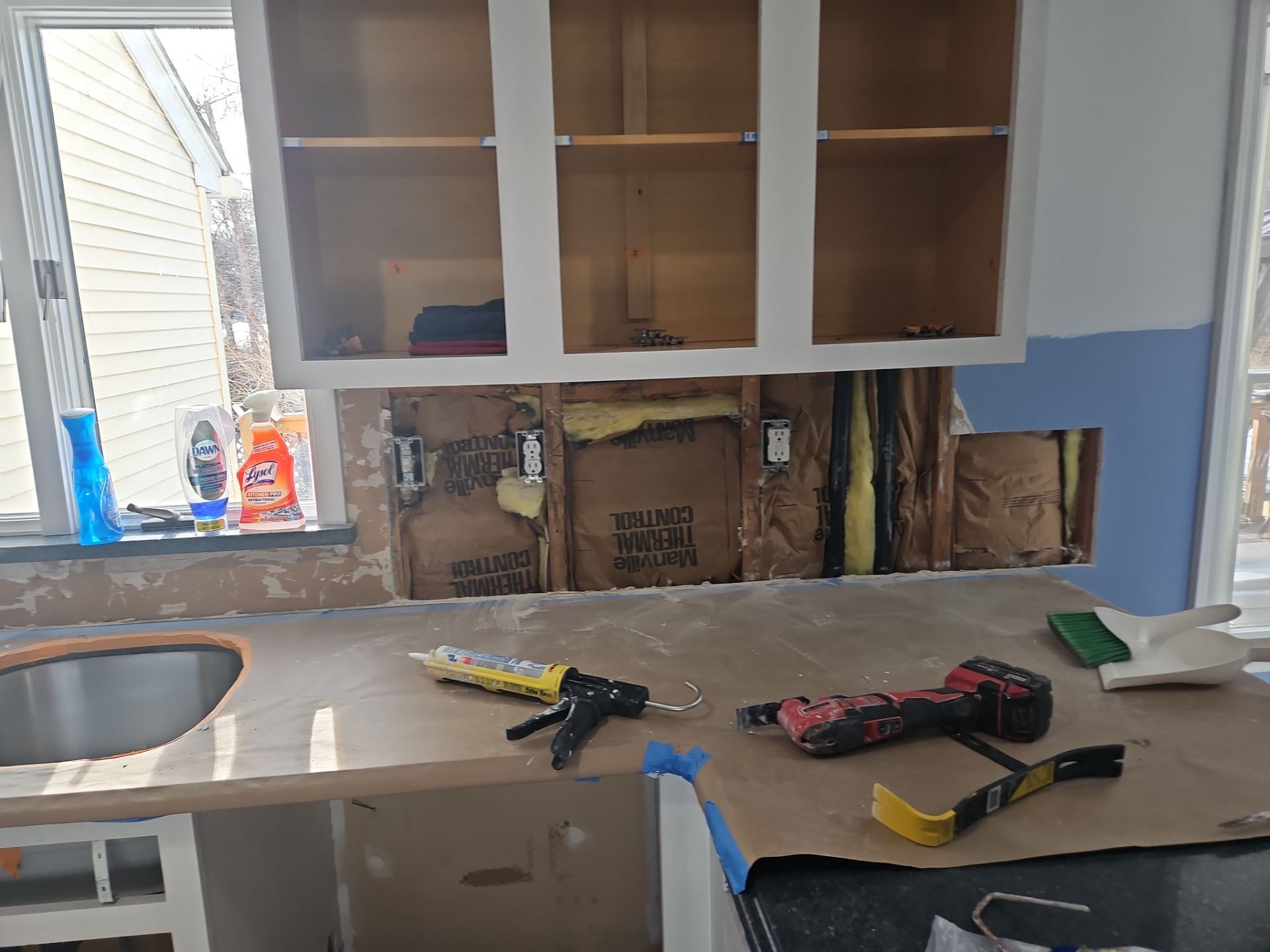 Cabinet Refinishing using Benjamin Moore Command by Spectrum Painting, LLC