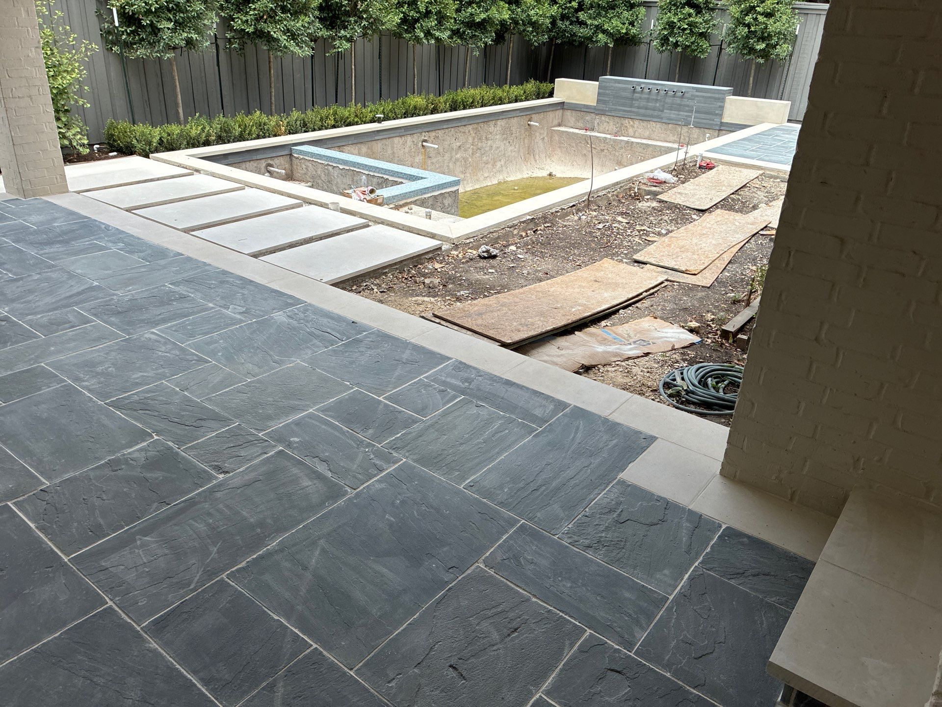 Custom Swimming Pool and Flagstone Patio Installation in Dallas by Hobert Pools