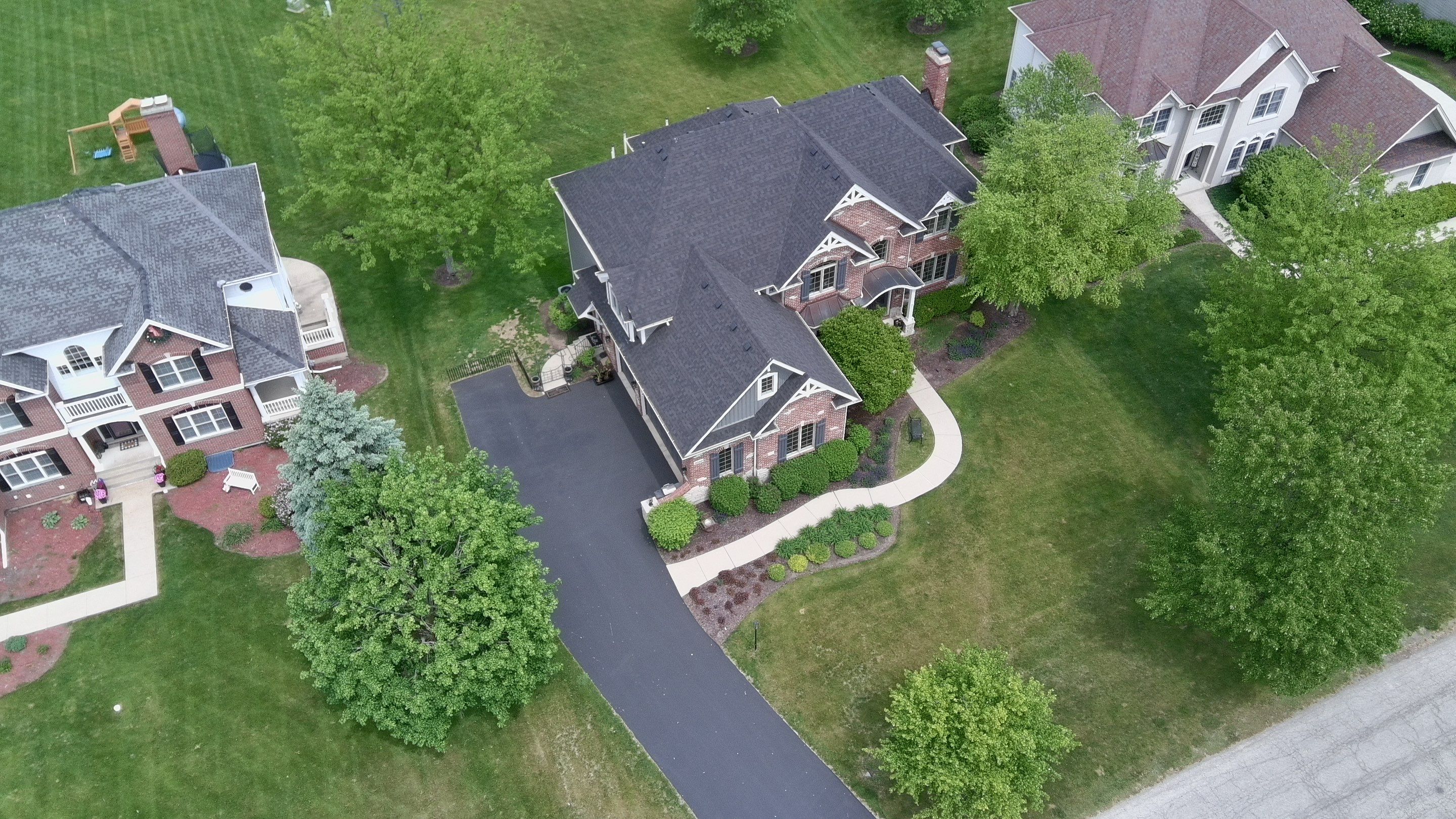 Re-roof: IKO Dynasty in Glacier by Midwest Building Solutions