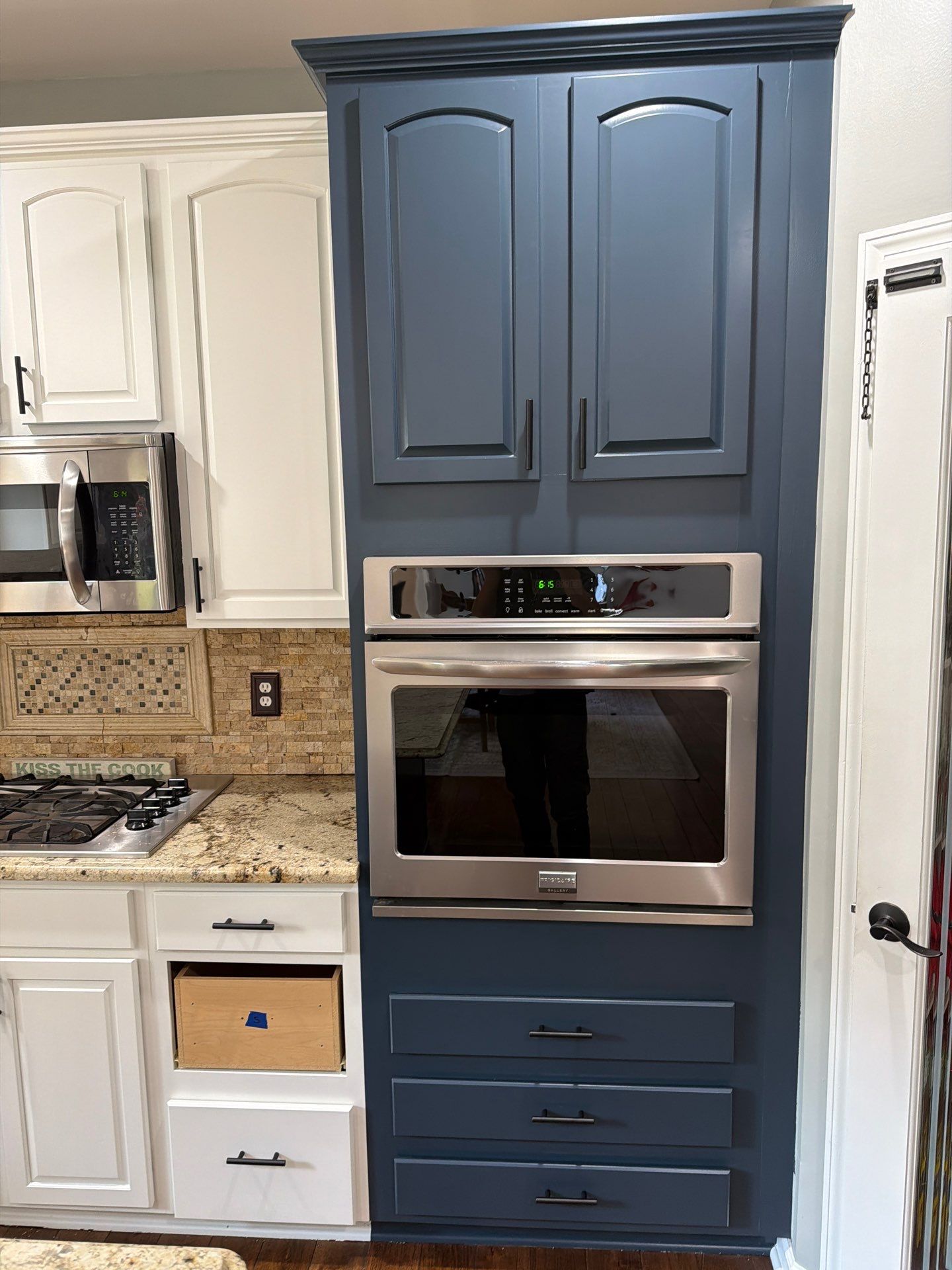 Kitchen Cabinet Refinishing by Top Shelf Painter