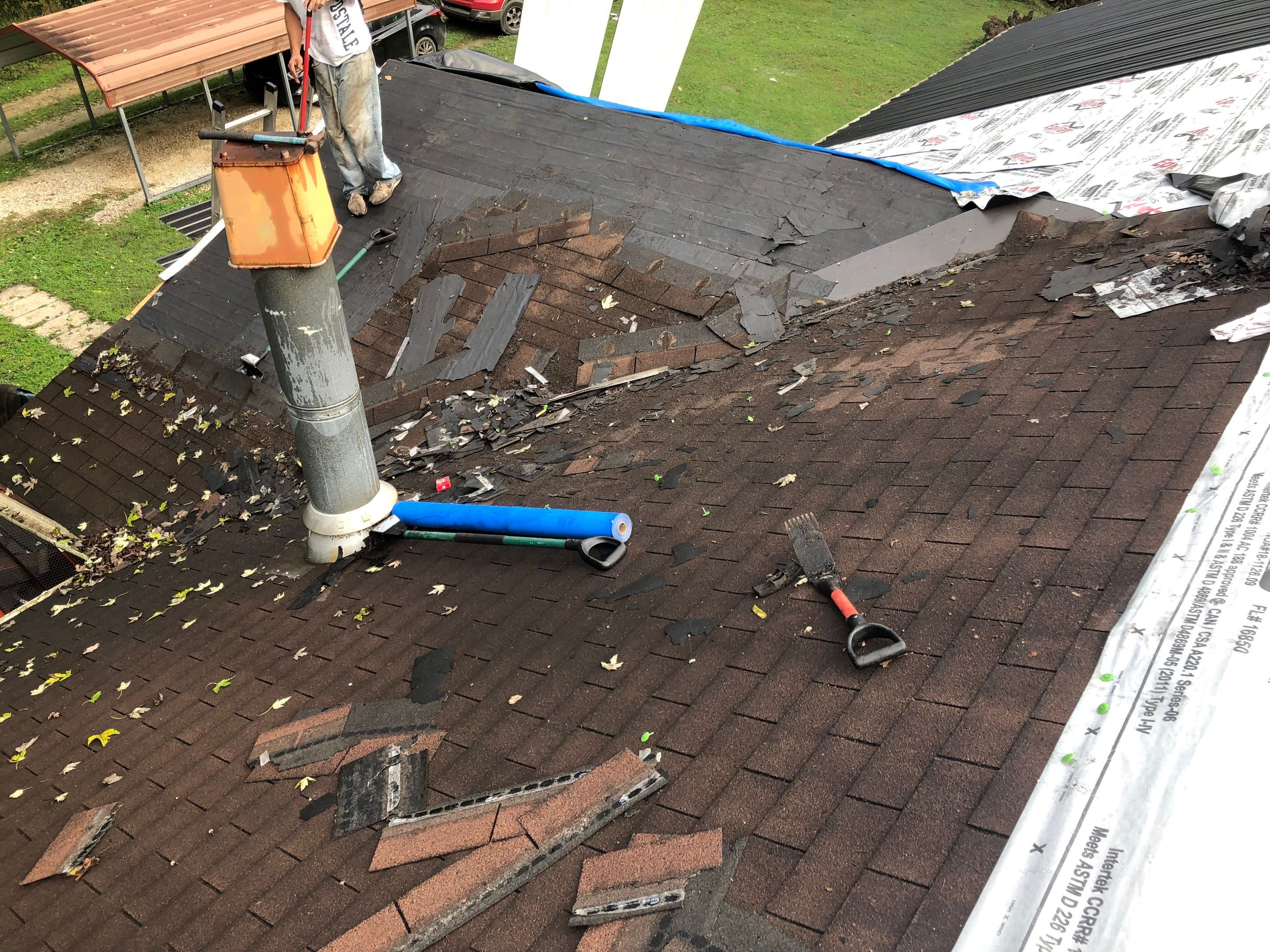 Metal Roof and Vinyl Siding, Soffit, Gutters using LifeTite Premium metal roofing  by Secure Construction Company Inc