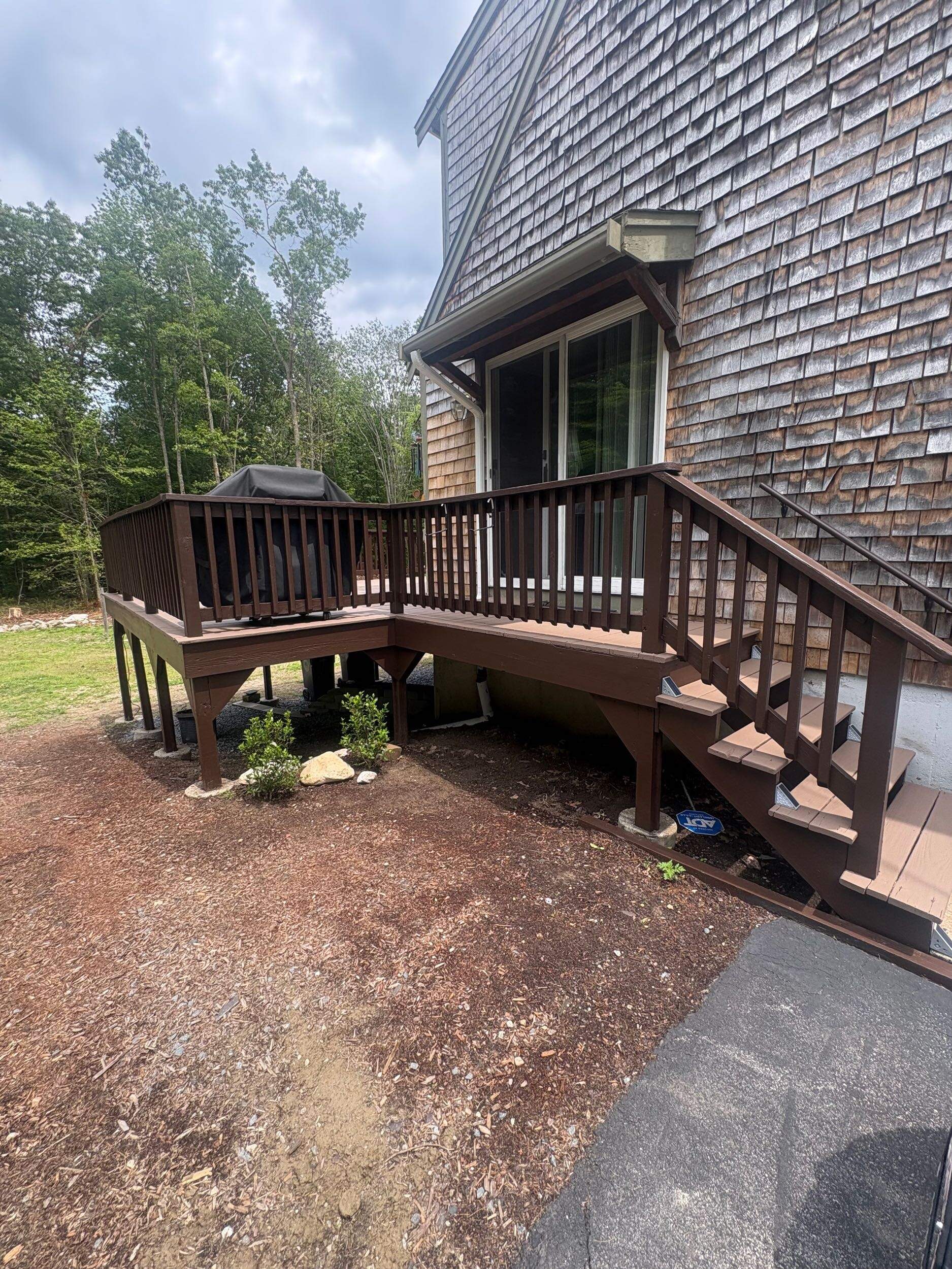 Deck stained in Norwell, MA by Us Propaint And Renovation