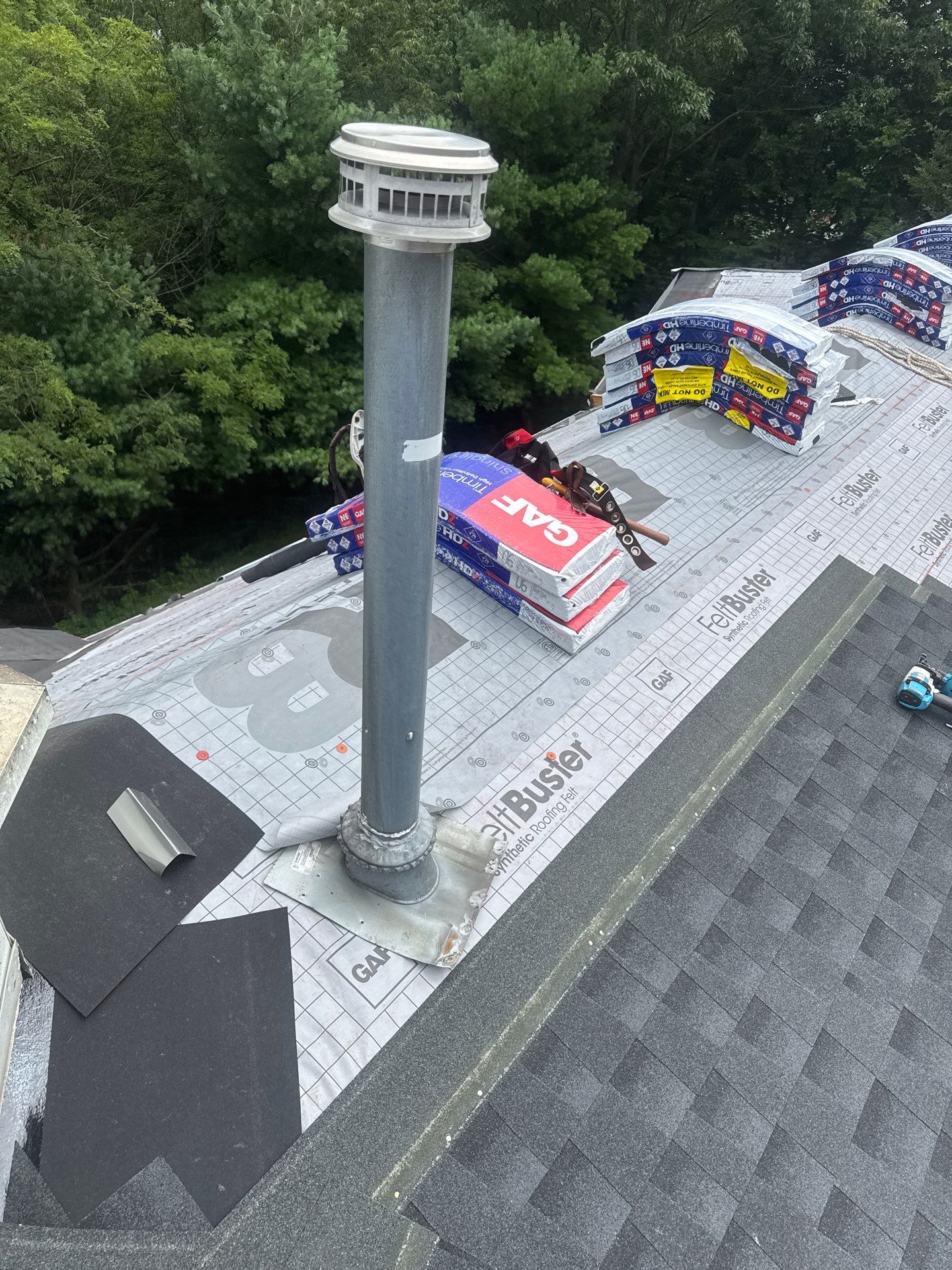 Commercial Roofing Installation using GAF Timberline HDZ Charcoal by Rainstoppers Roofing