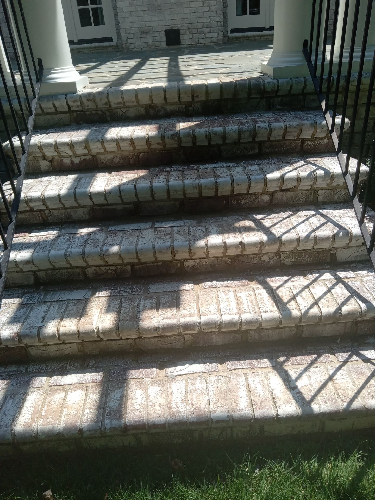 pressure washing to clean and restore brick steps before after comparison visible