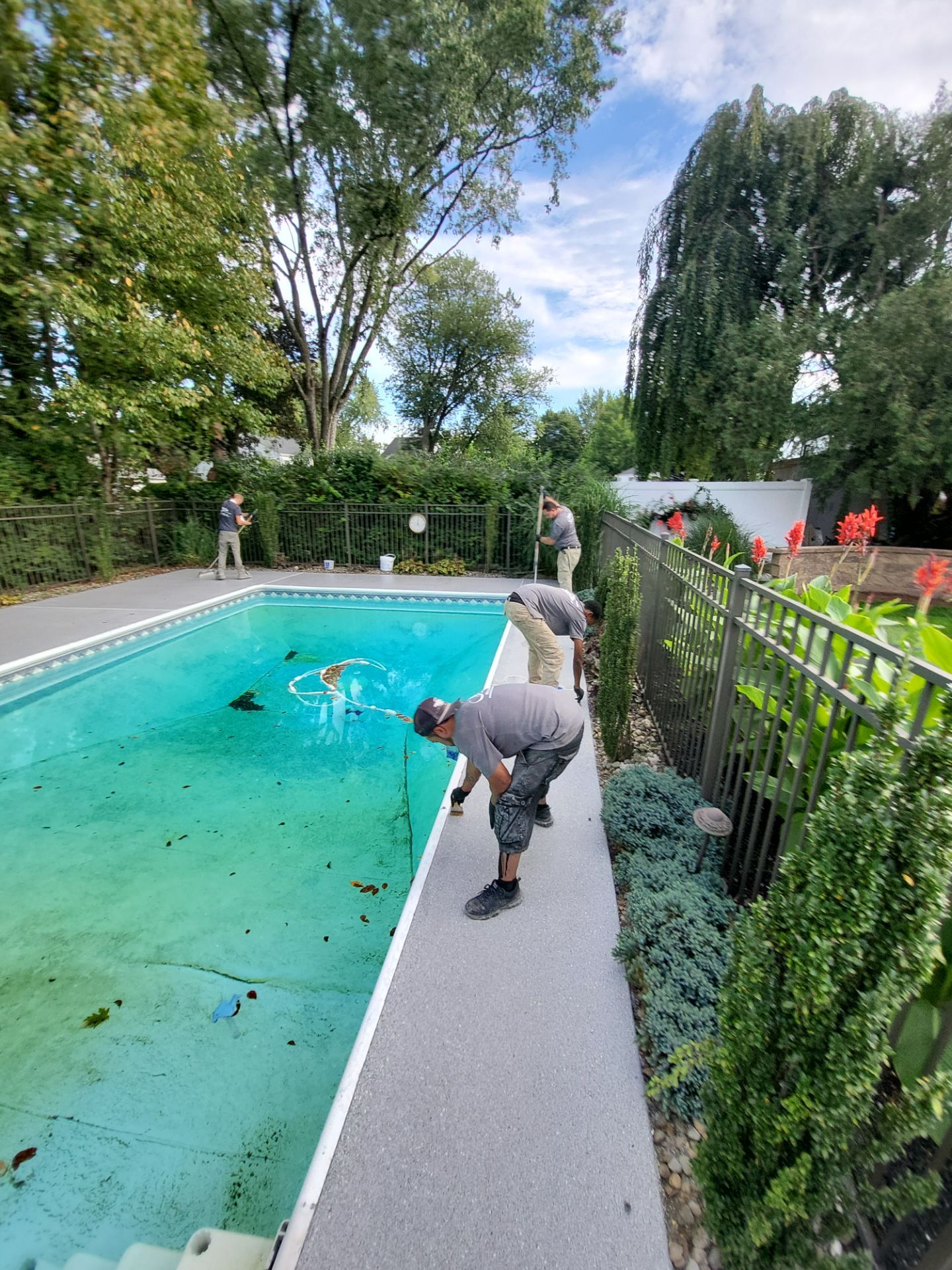 Blue Granite Pool Patio Concrete Coating in Lincoln Park by Spectrum Painting, LLC