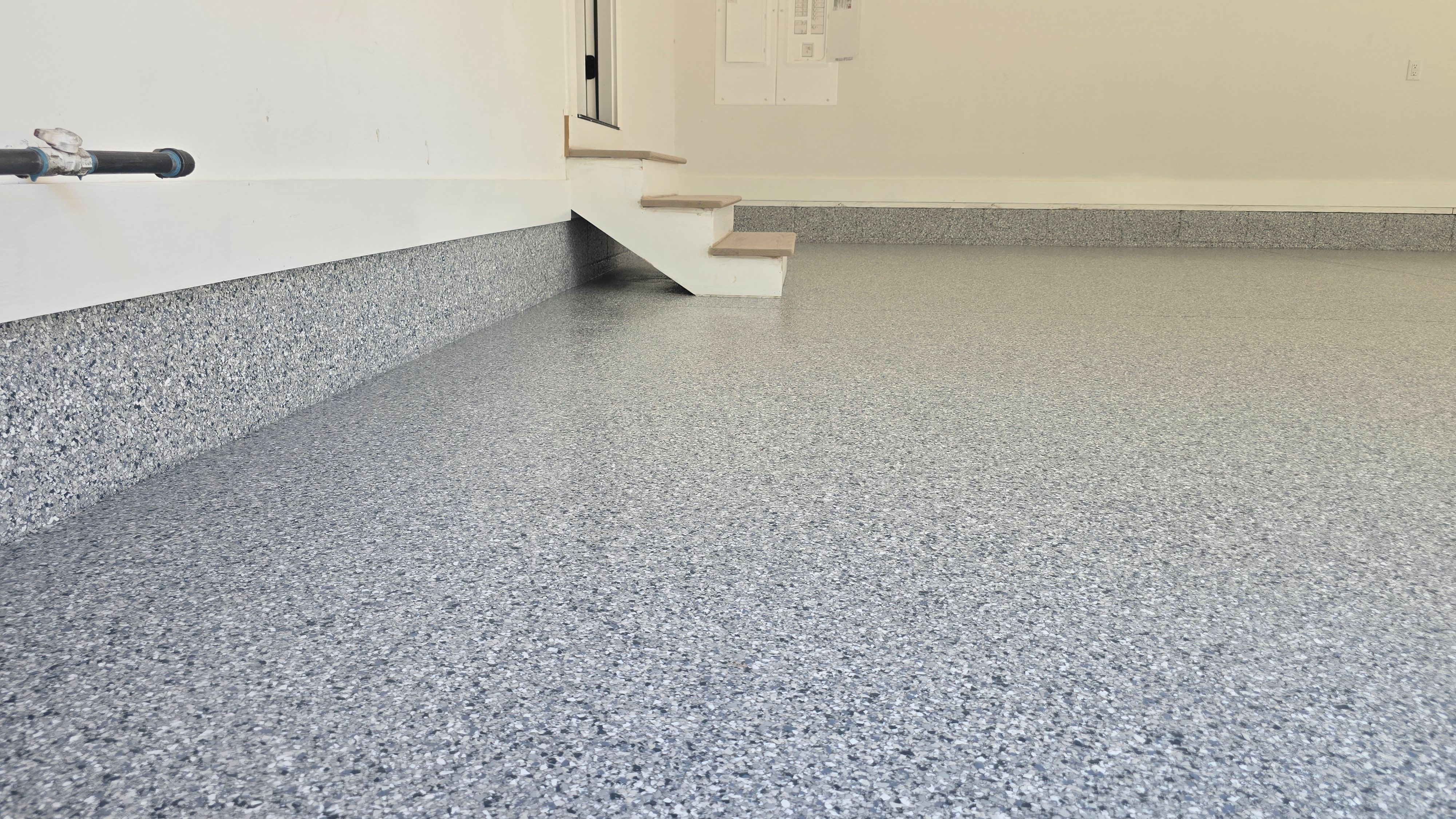 Porch & Garage Using Tidal Wave & Gravel  by Elite Floor Solutions