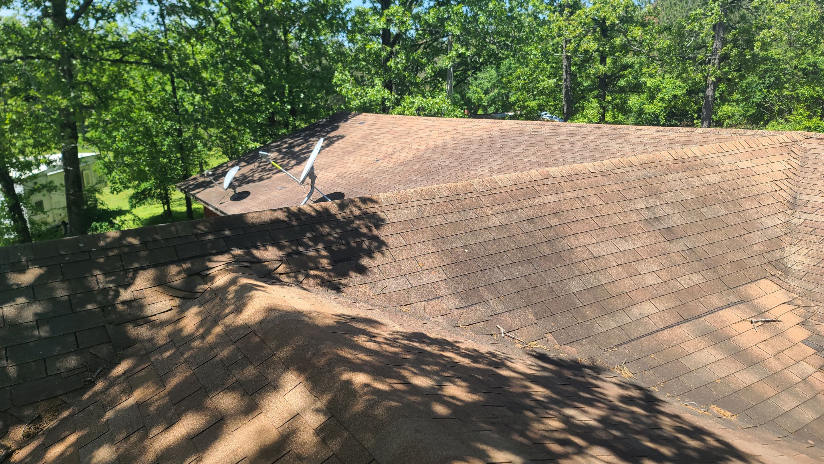 Storm Restoration Reroof: 25 Year 3-Tab Shingle by Hostetler Roofing