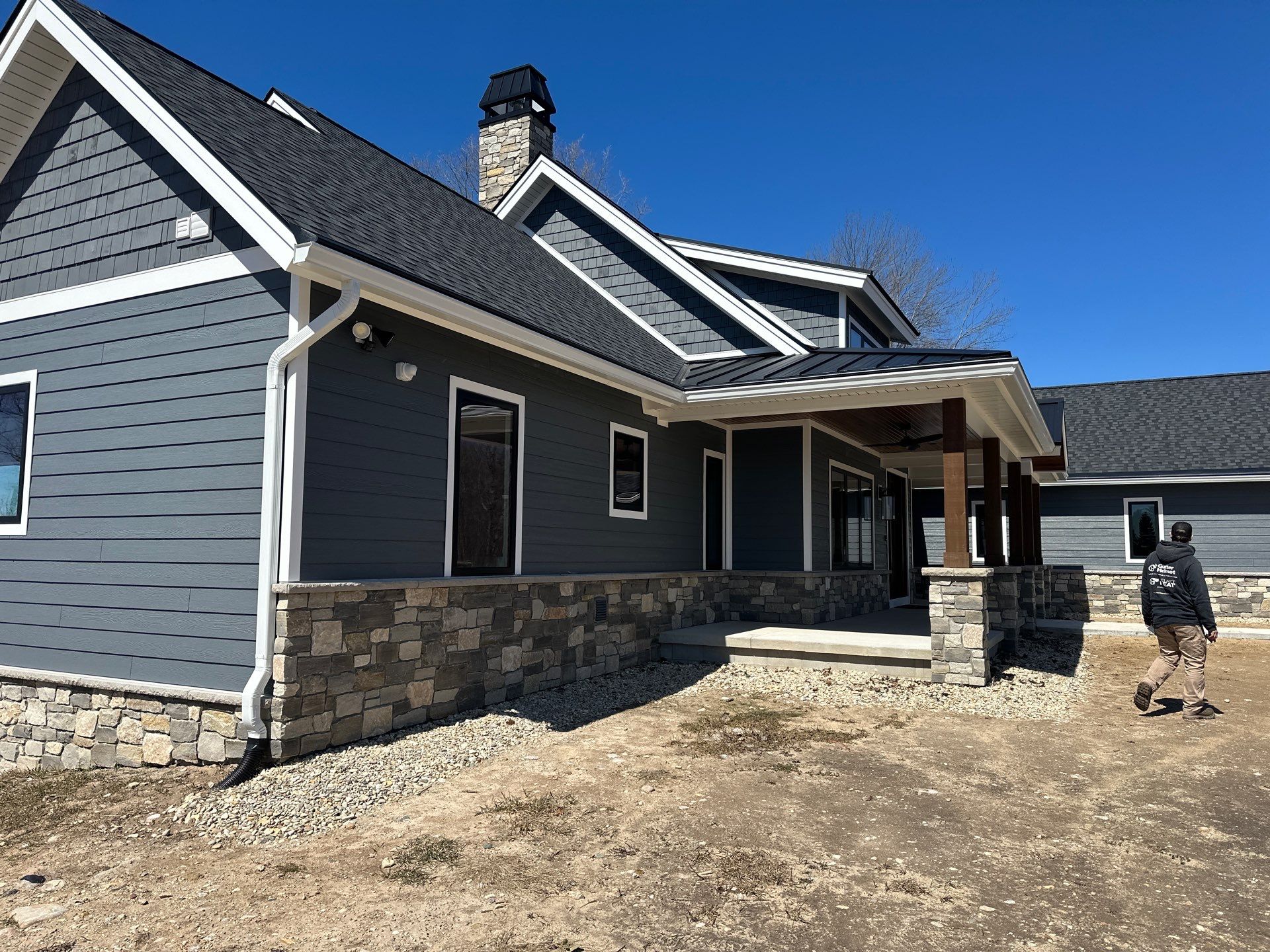 Residential Gutter and Downspout Installation for Ellsworth Home Exterior by Rainbow Seamless Systems