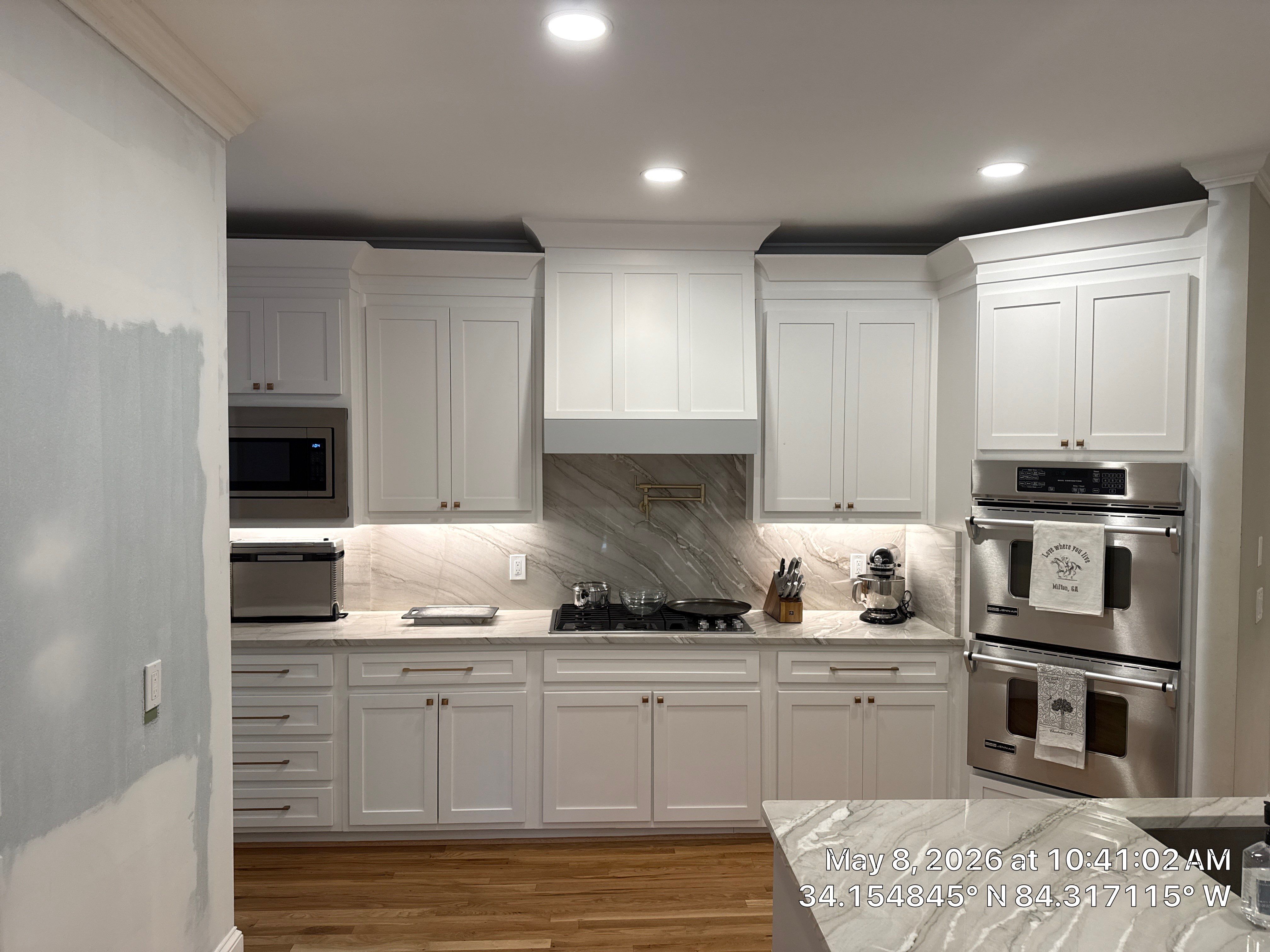 Alpharetta Kitchen Remodel Featuring Double Islands and White Quartz by Heart & Home Kitchen & Bath Remodeling LLC