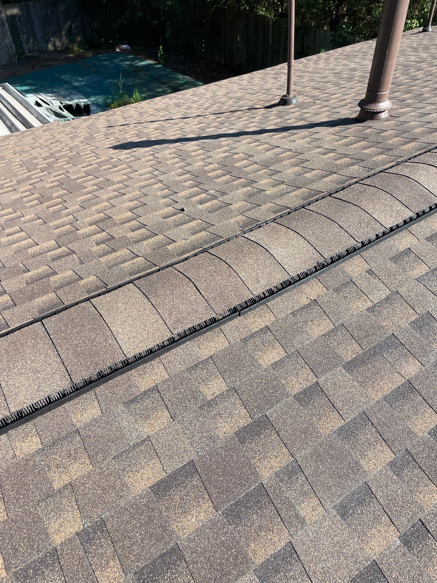 Residential Roofing Installation using GAF TImberline HDZ Hickory by Rainstoppers Roofing