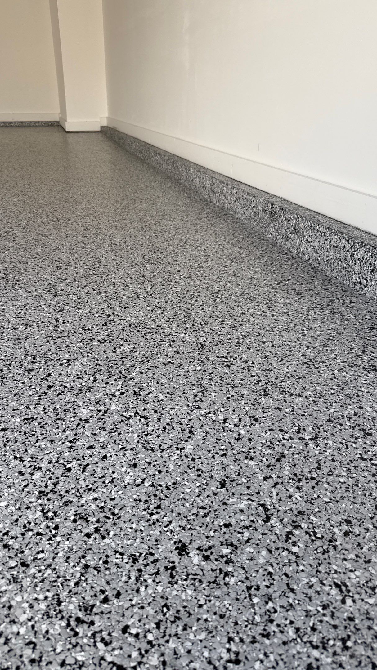 Joe Chose This Amazing Houndstooth Flake Floor by Banner Garage