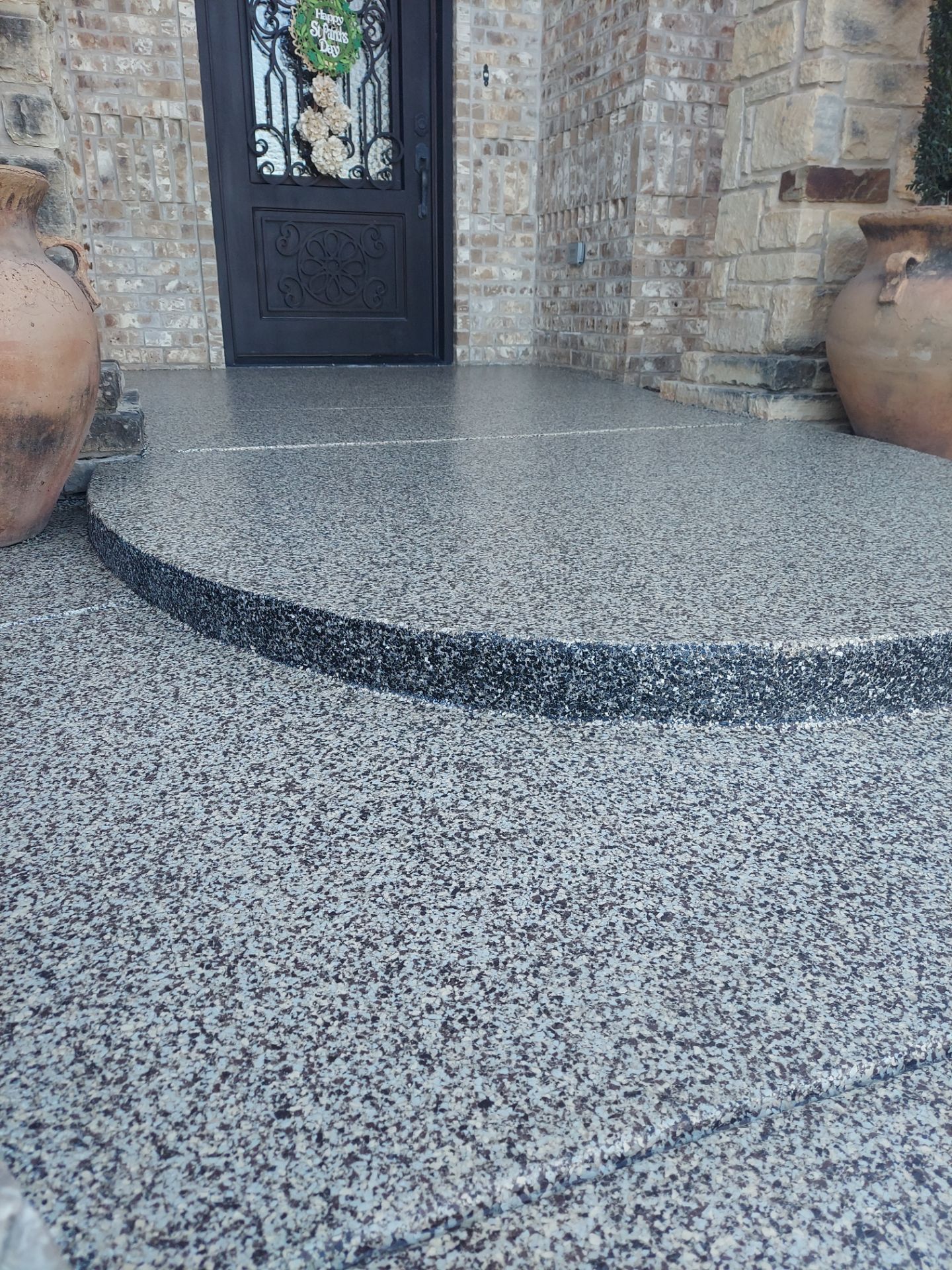 Patio Coating Installation using Cordwood by Copperhead Coatings