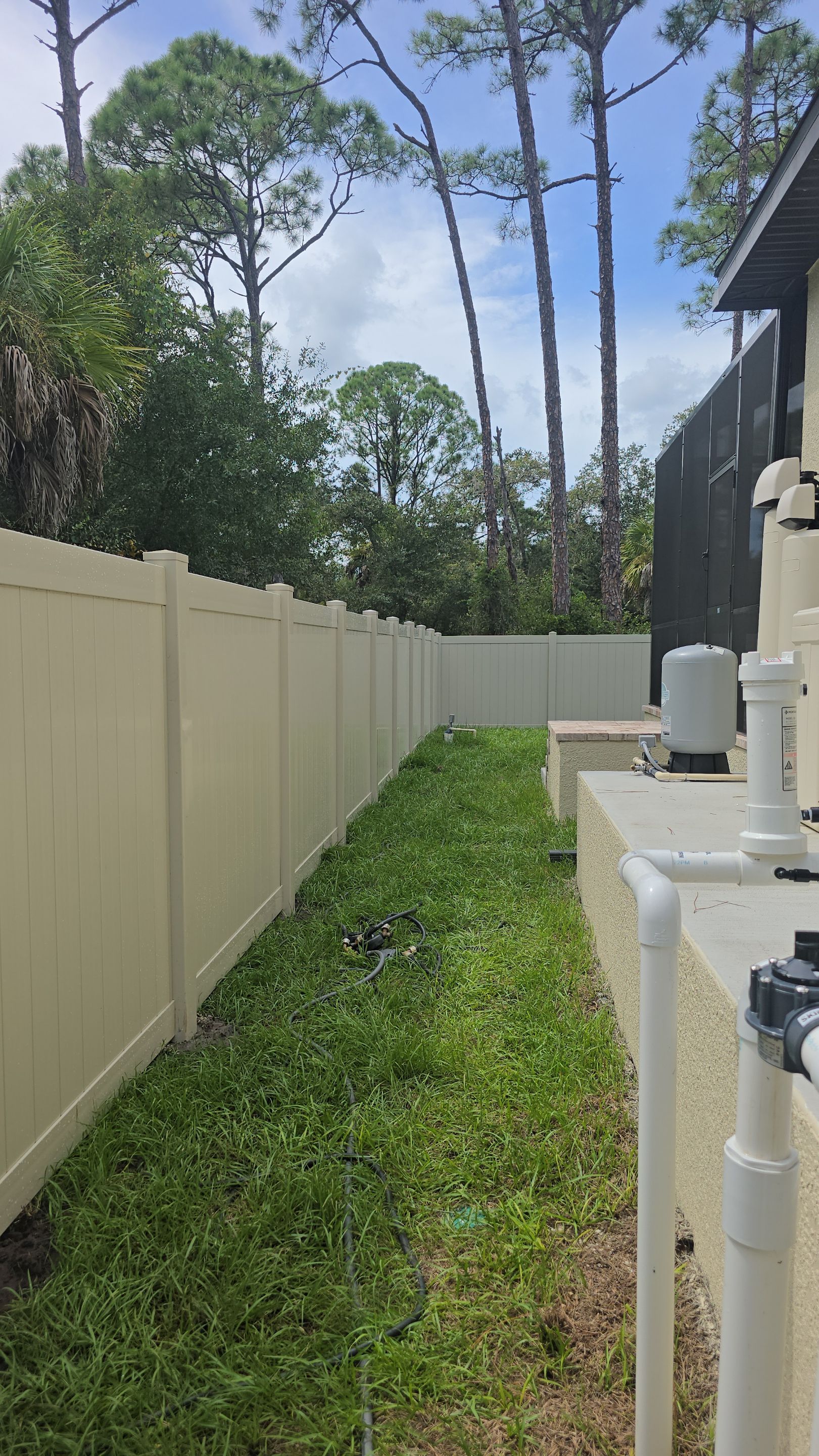 Tan Vinyl Privacy Fence and Gate Installation in Port Charlotte by True Fence LLC