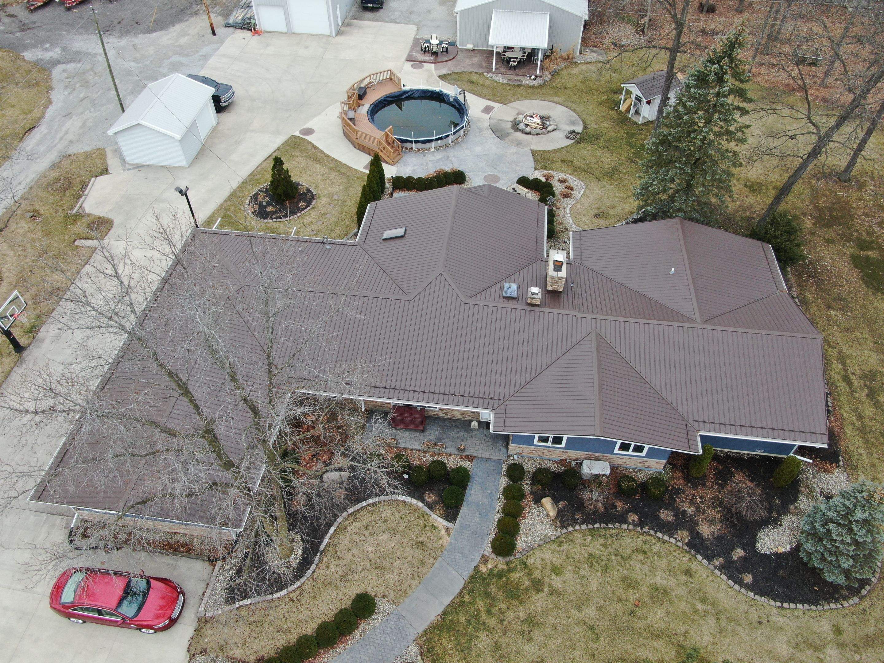 Residential Roofing Installation using Exposed Fastener Metal Roof by 4Ever Metal Roofing