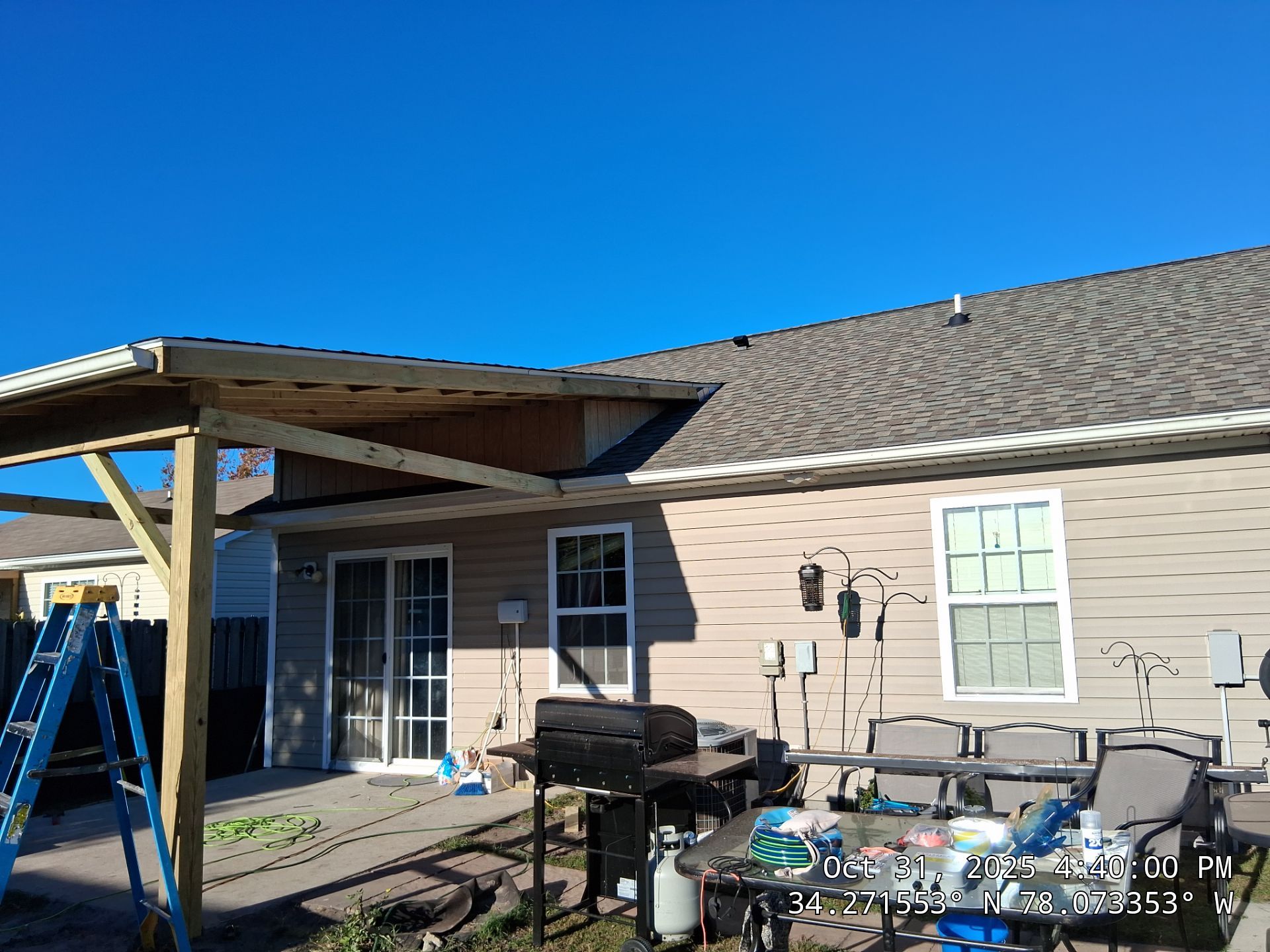 Covered Porch Build and Fortified Roof Replacement with Solar Panels by RGR Construction and Roofing, LLC