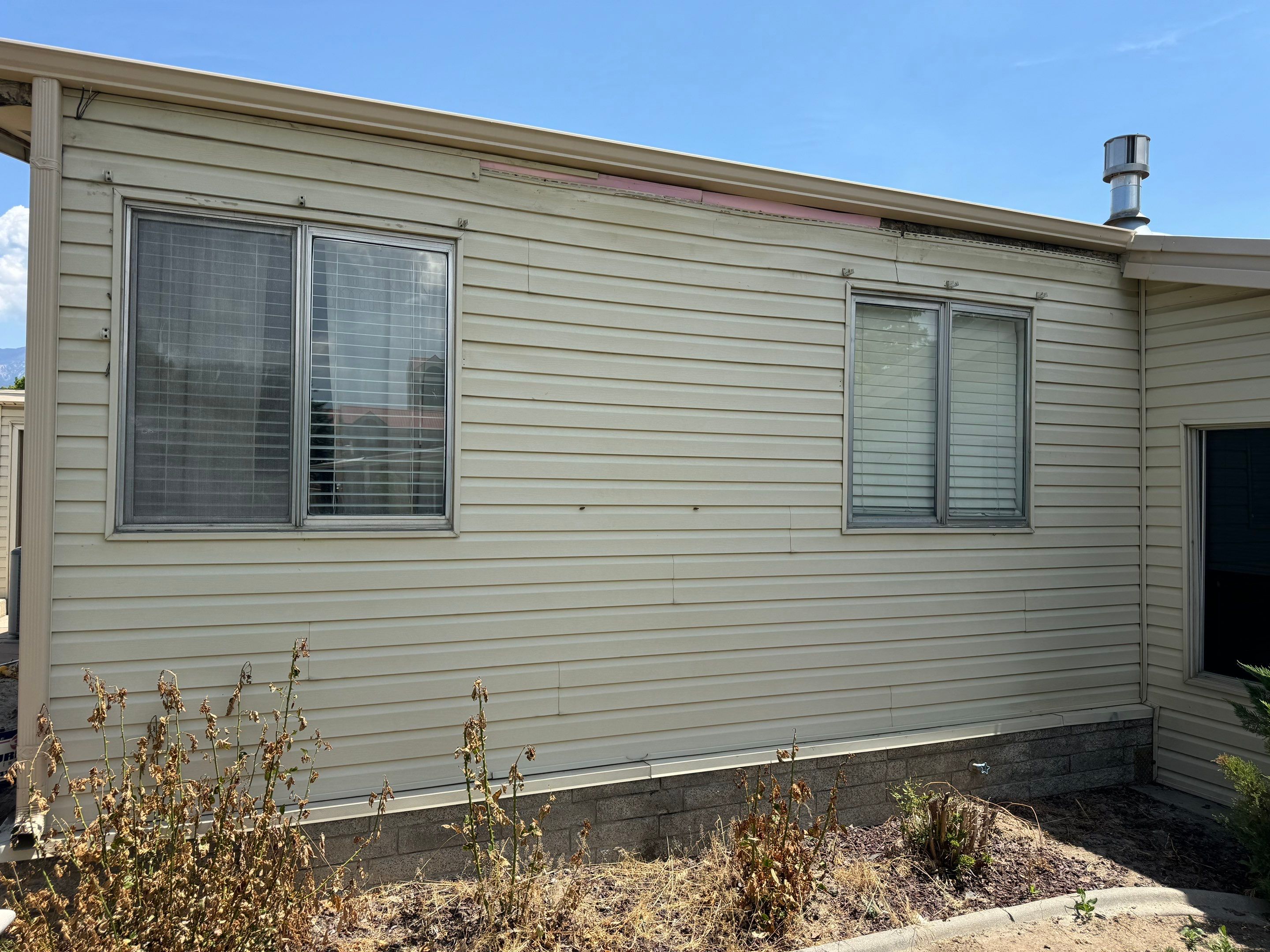 Salt Lake City | Targeted Vinyl Repair & Sheathing Update | Almond by Ideal Siding Utah