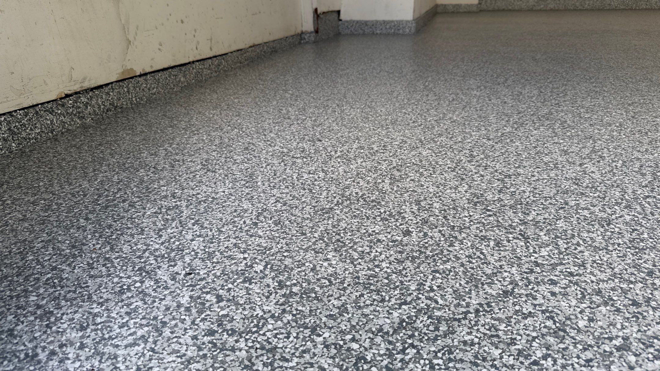 Drew Has The Nicest Floor On The Block  by Banner Garage