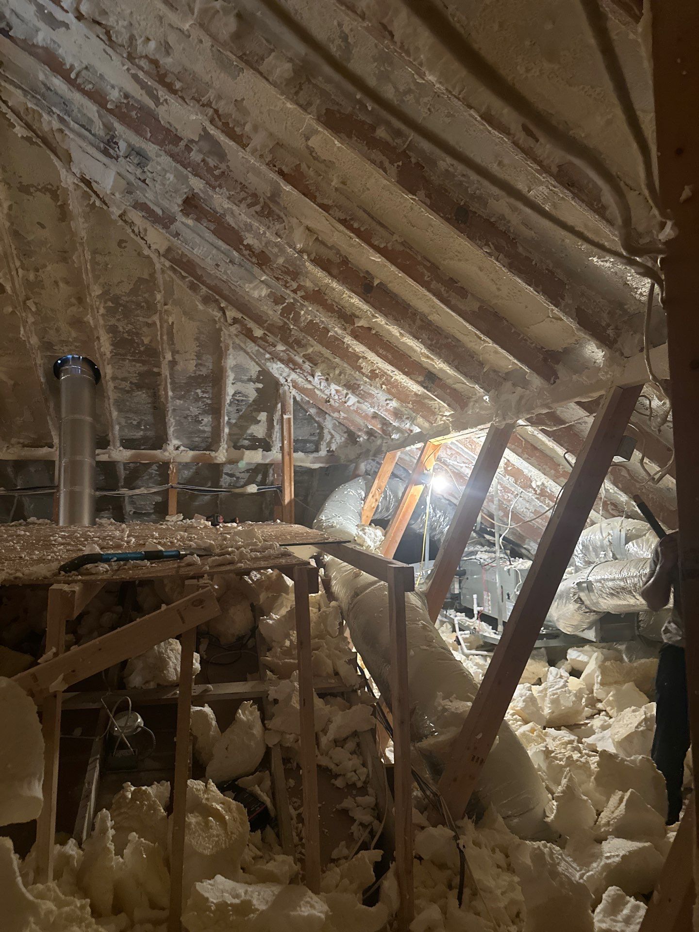 Spray foam insulation removal & re spray by Apex Insulation Solutions