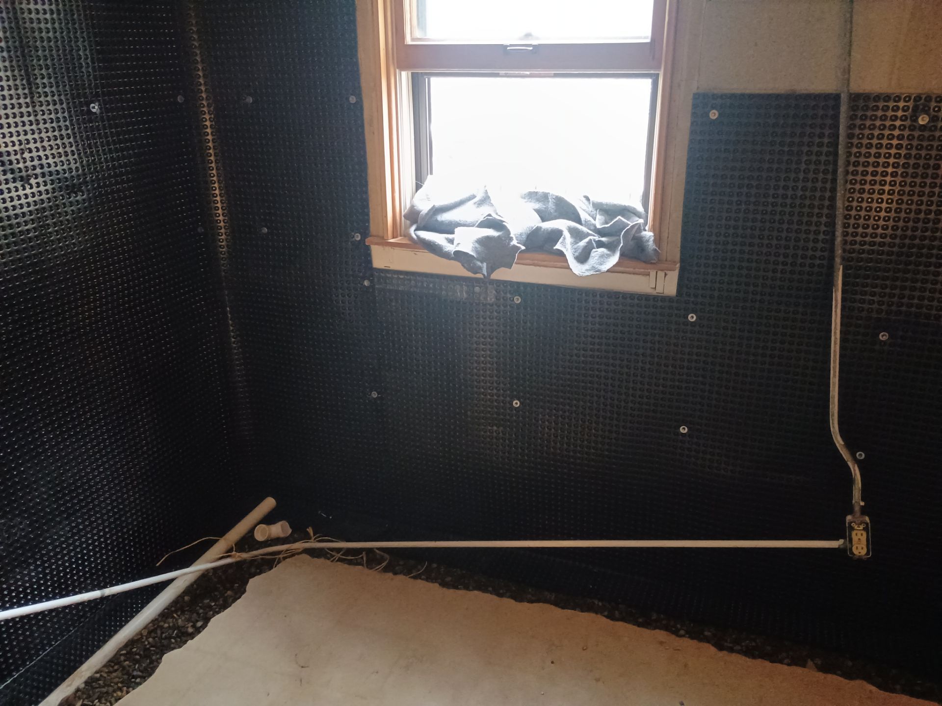 Interior Drain Tile & Foundation Crack Repair in St. Anthony, MN by Waterproofing Northeast