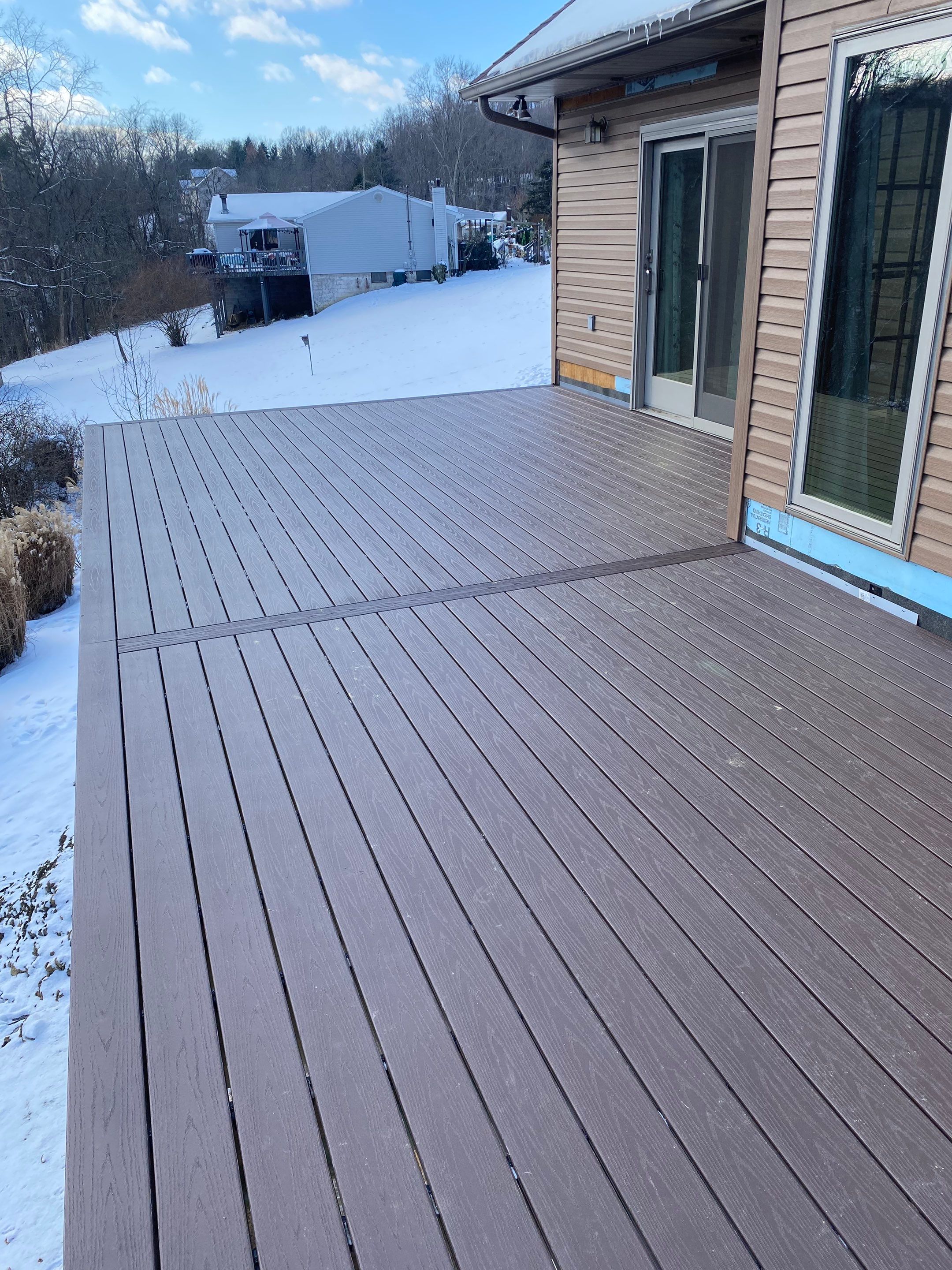 Deck and Roof Build by Cousins Roofing Siding & Decks