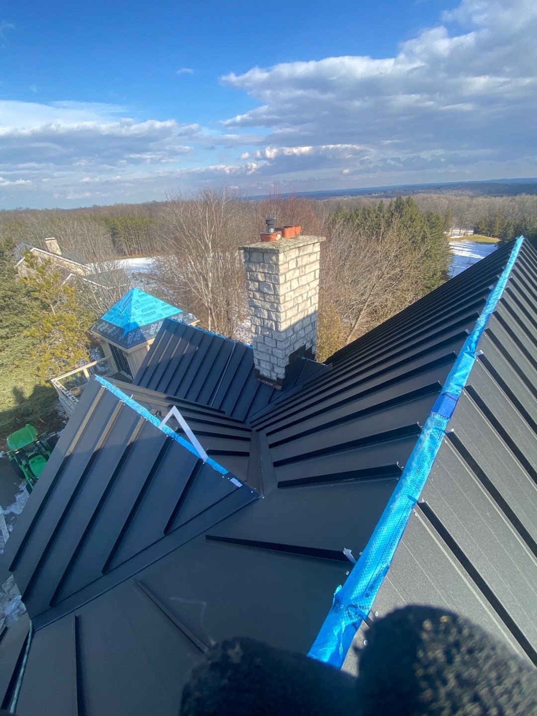 Residential Roofing Installation using 24 Ga Standing Seam Metal by Jay Carter Roofing & Sheet Metal