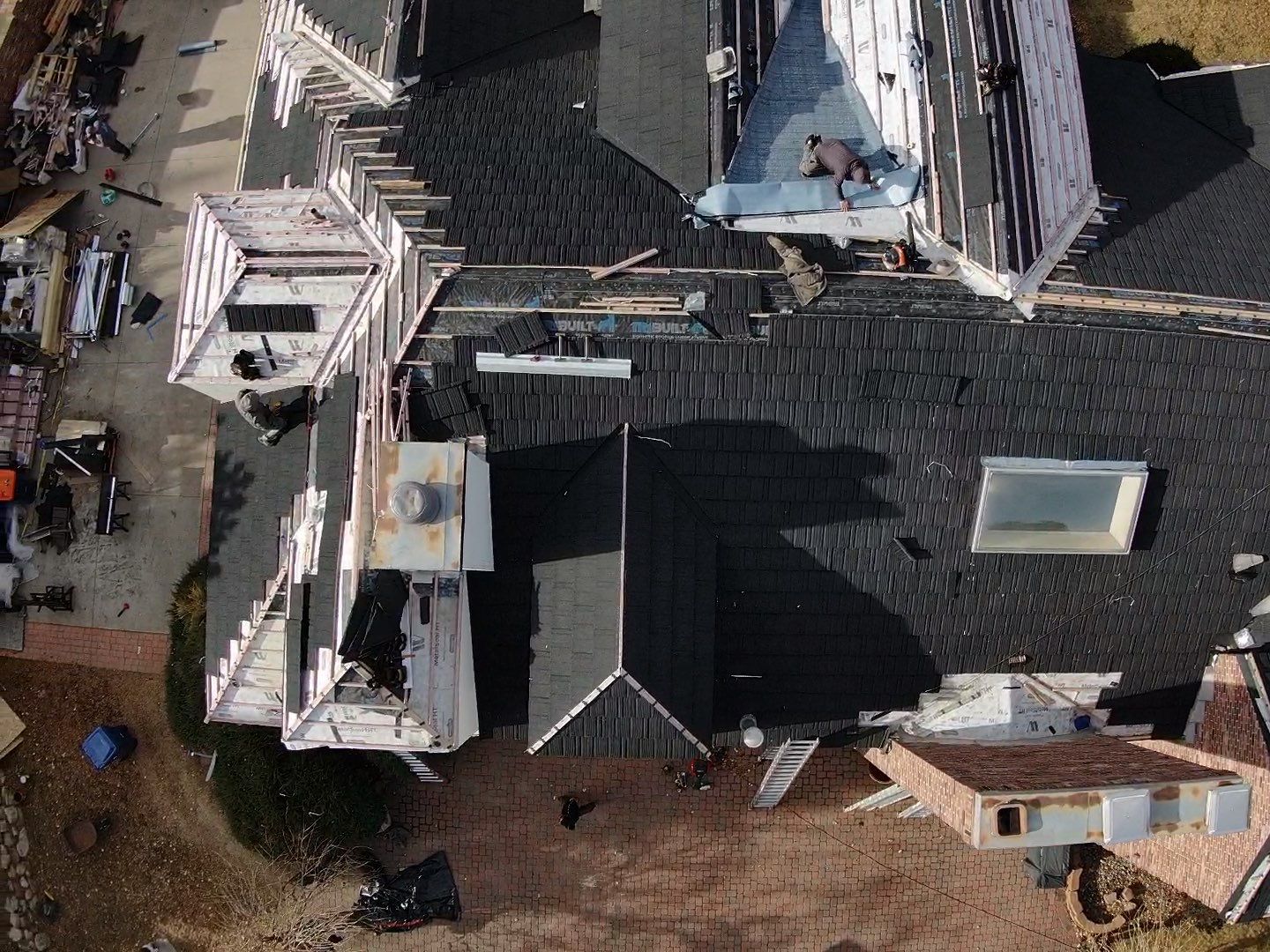Unified Stone Coated Roof & Stucco Remodle by Blue Peaks Roofing LLC