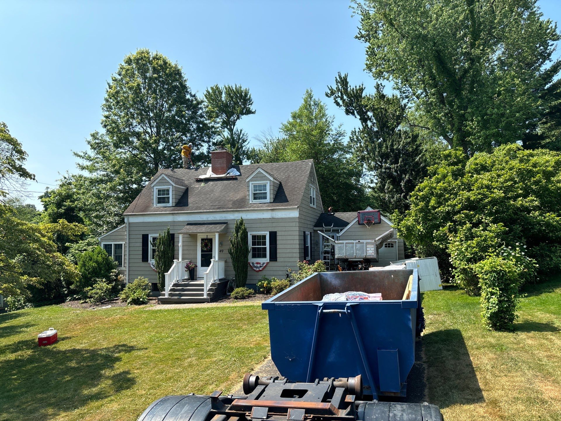 Complete Exterior Estate gray with Pacific Blue Siding by A Plus Exterior