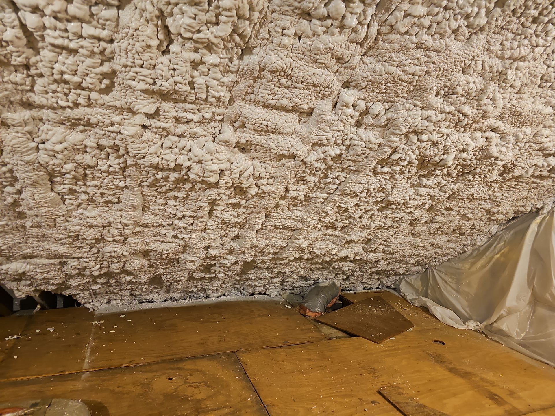 Attic Retrofit using open cell spray foam by NYS Foam & Energy