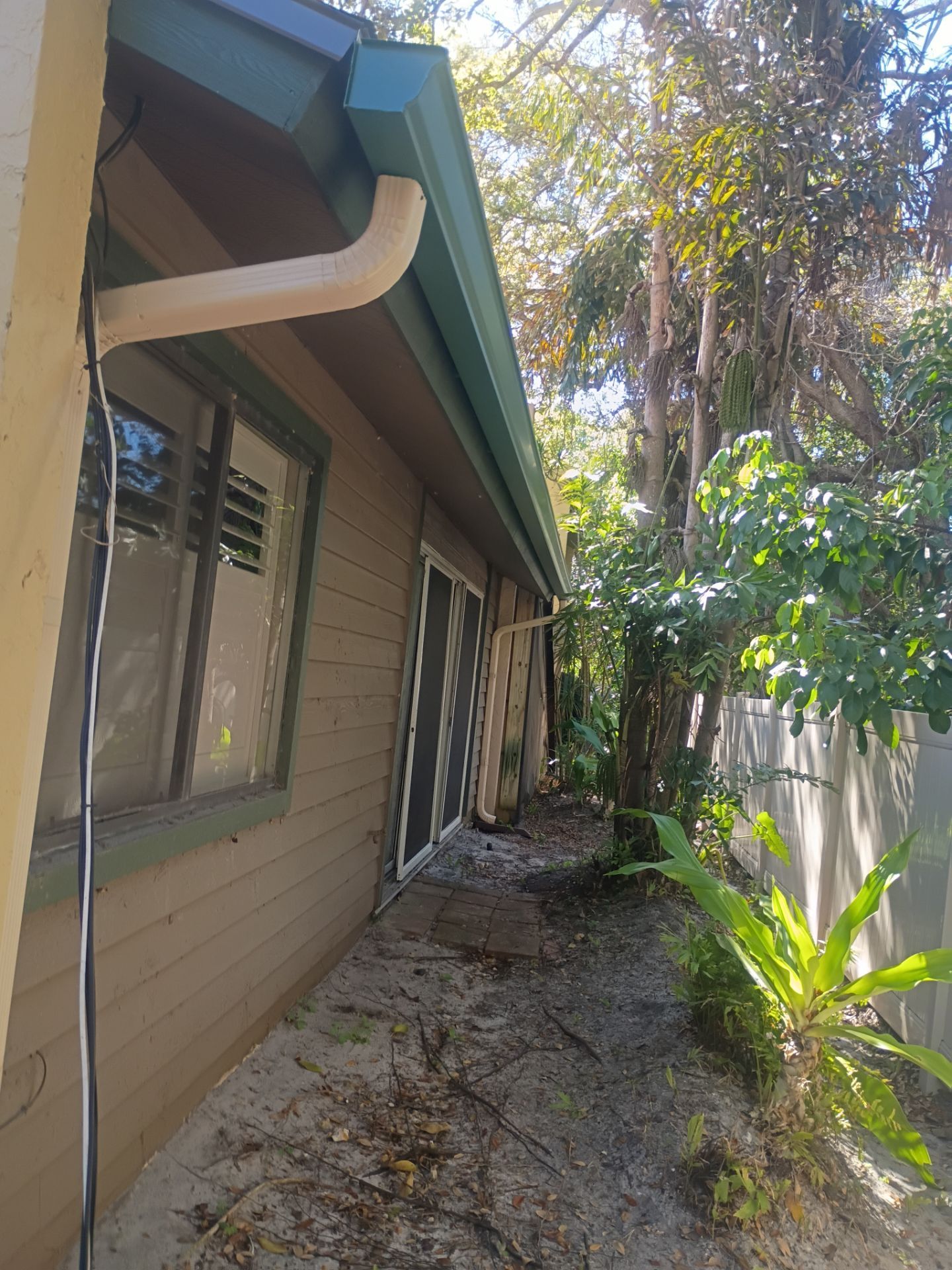 Leaf Guard using Gutter Guards & 3X4Downspoutsts in Sarasota FL by Gutter Professors
