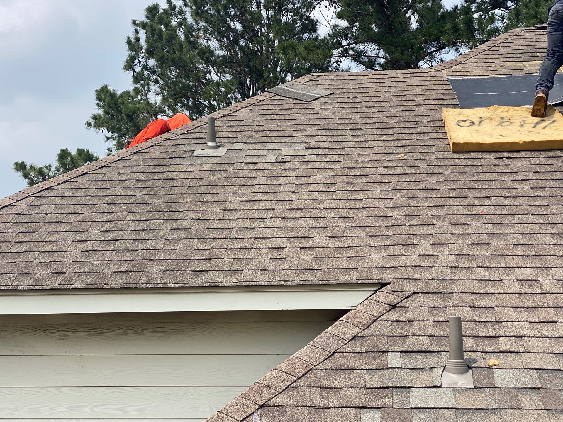 Hail Damage using Owen's Corning Duration (Lifetime) Shingles by Roof Repair Company