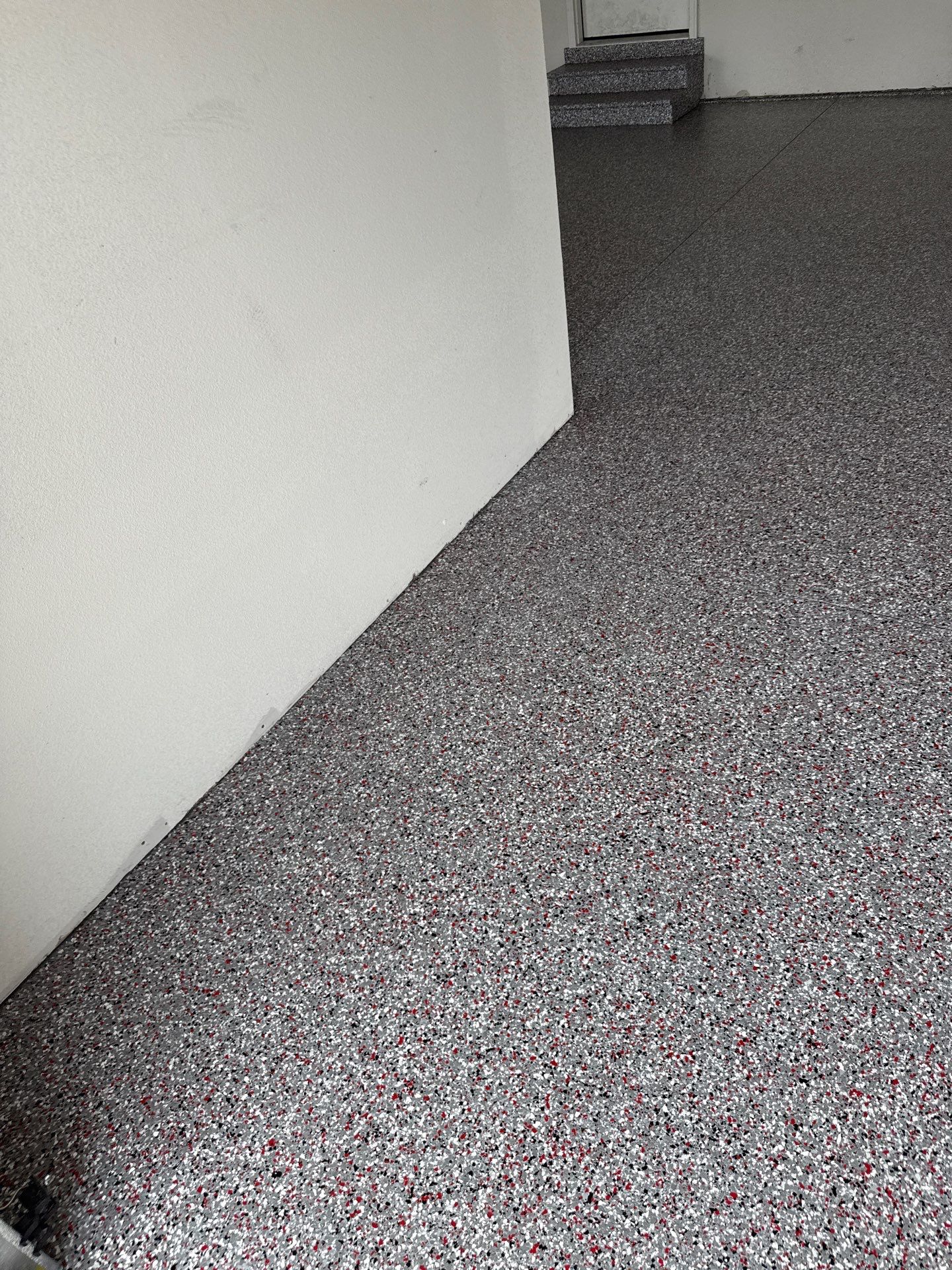 Custom Flake Garage Floor Coating Installation in Altoona by Revival Concrete Coatings