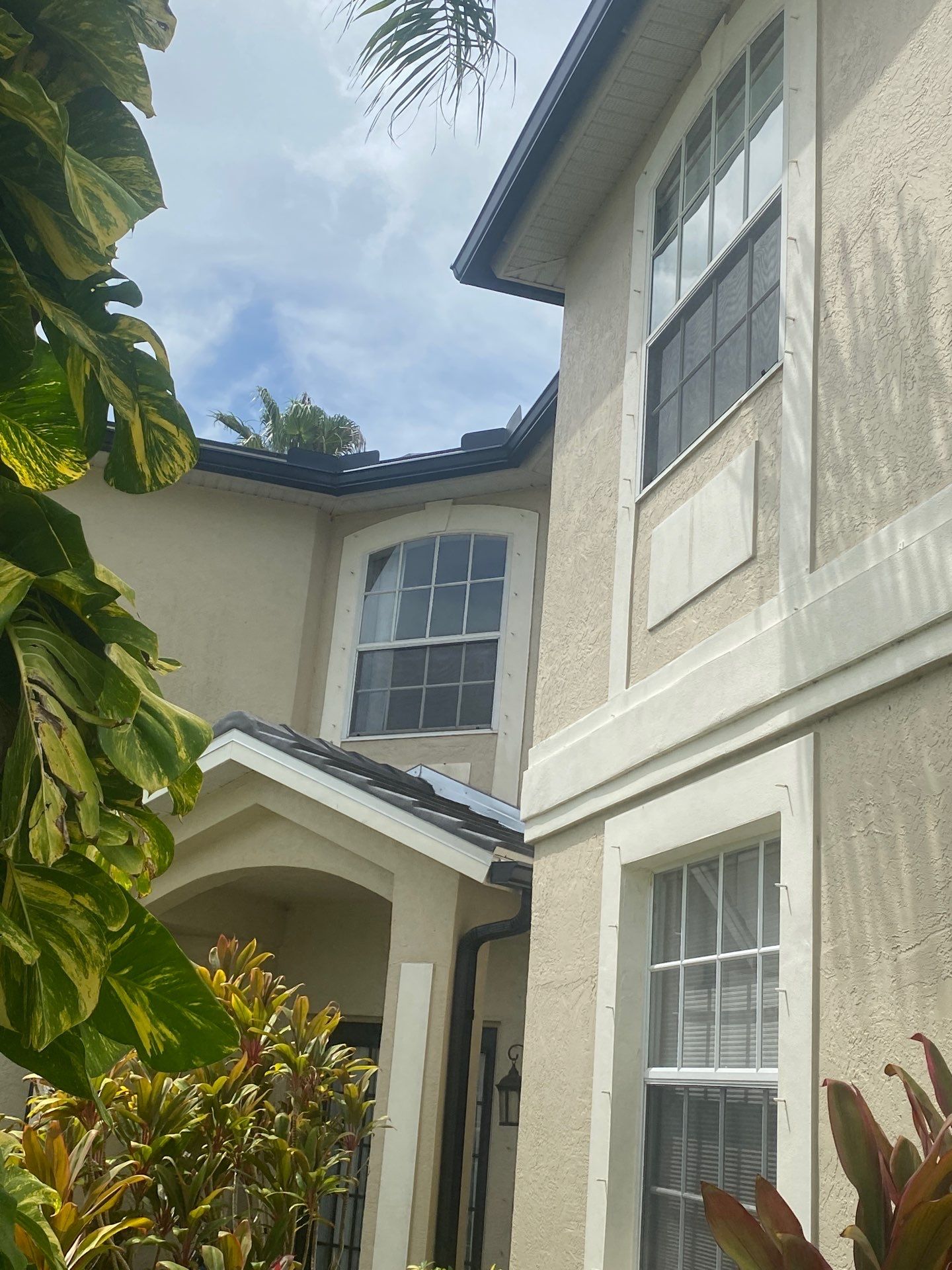 Black Seamless Gutters for Modern Homes in Osprey FL by Gutter Professors