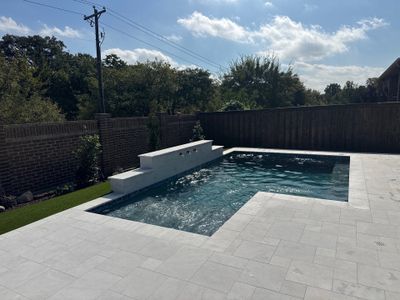 Modern Geometric Pool with Turf Surround